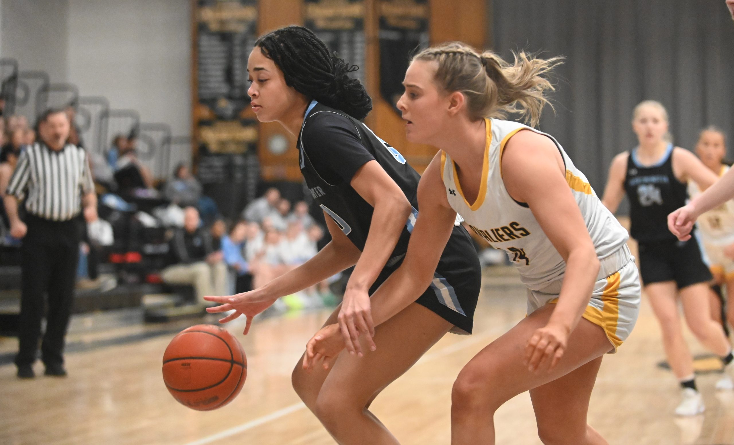 South Carroll's Charlotte Harrington tries to steal the ball away...