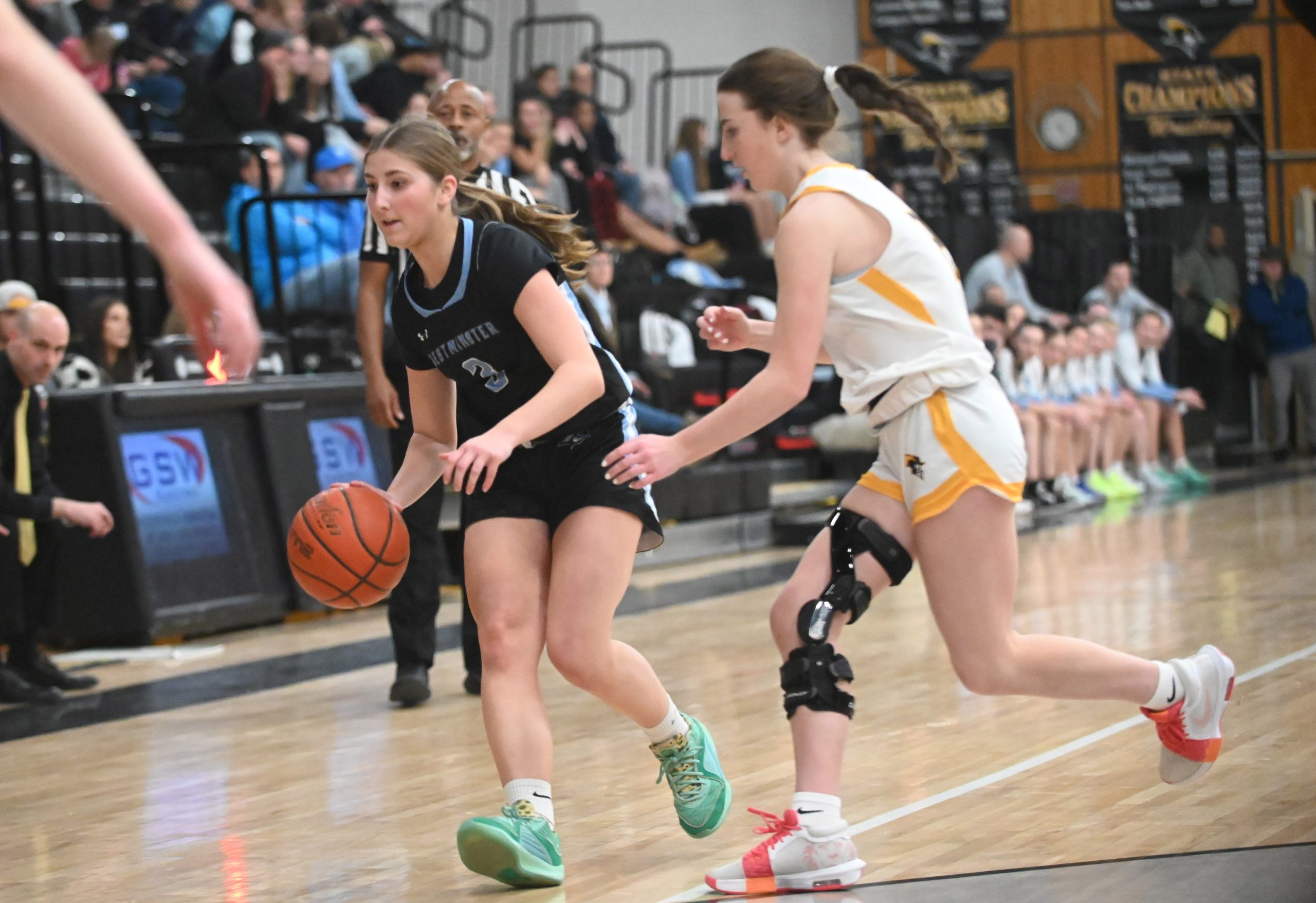 Westminster's Emma Jones dribbles the ball with South Carroll's Gabby...