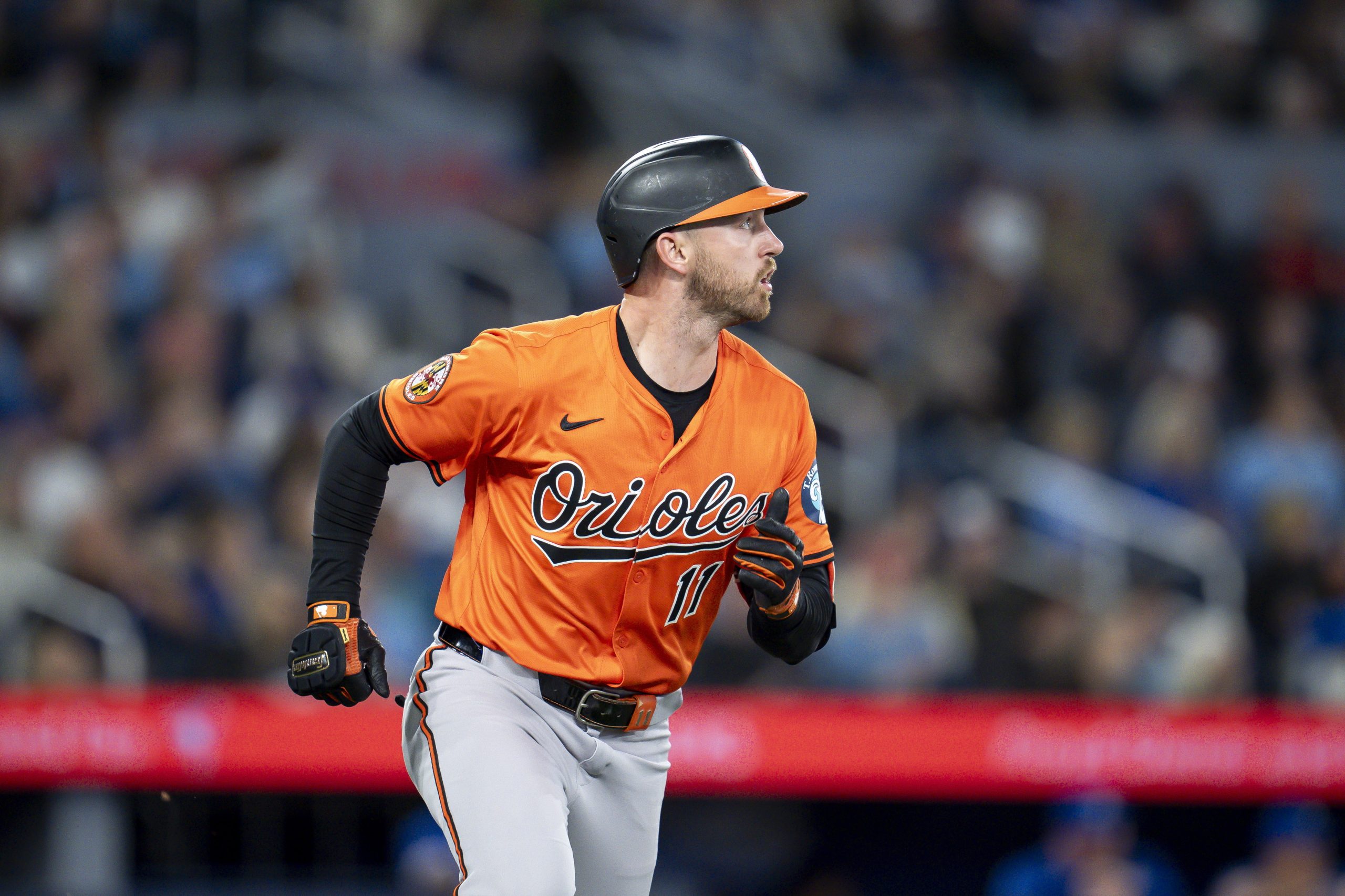 The Orioles' Jordan Westburg watches his home run in the...