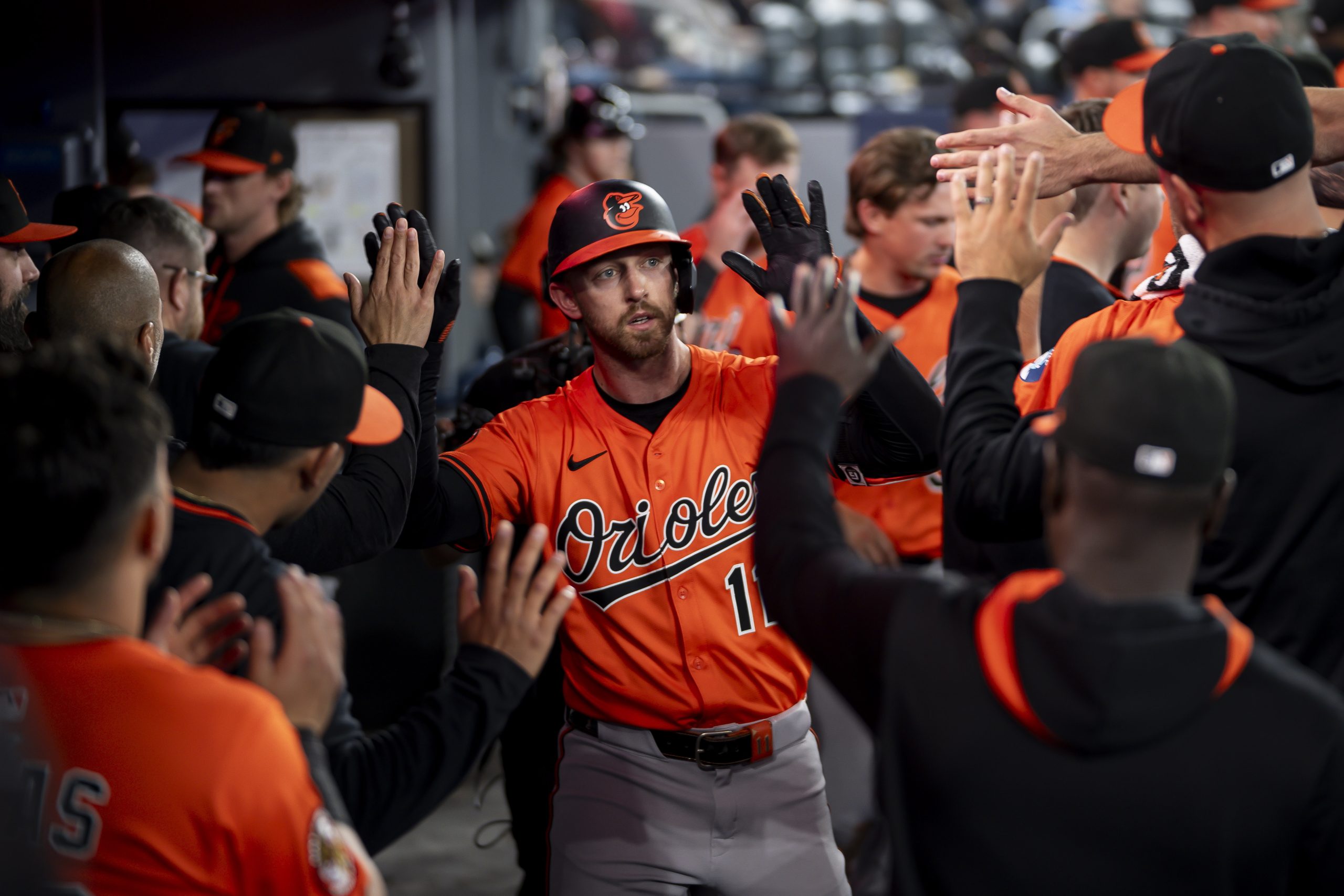 Baltimore Orioles' Jordan Westburg (11) celebrates in the dugout with...