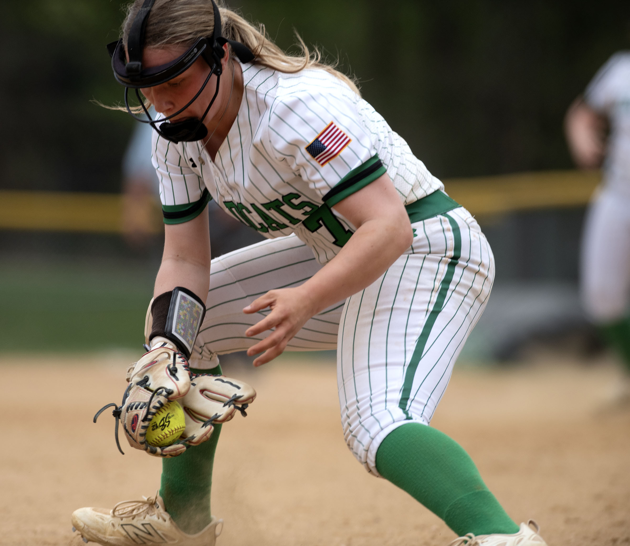 April 19, 2025- Arundel pitcher Anna Bristol fields a bunt...