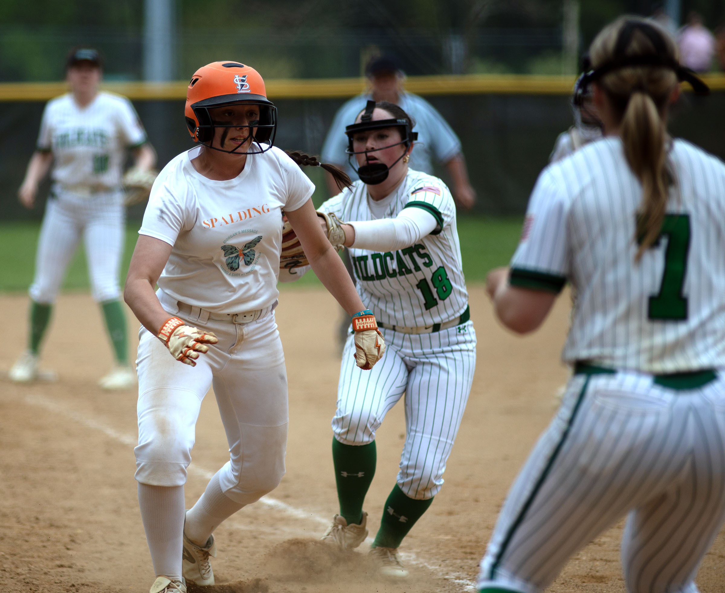 April 19, 2025- Spalding’s Tori Codi is tagged out by...