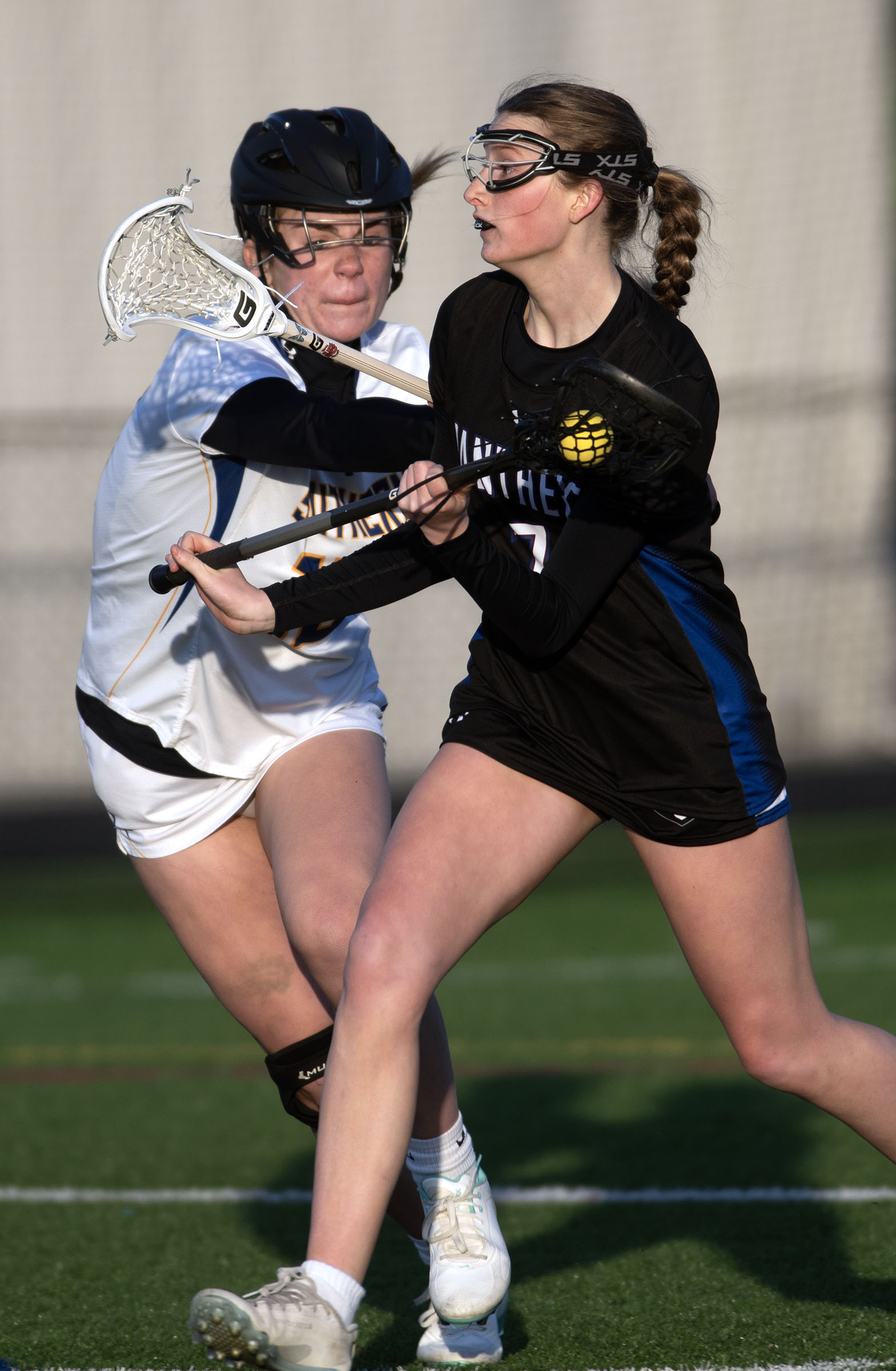 April 9, 2025- Annapolis’ Anna Colman tries to move around...