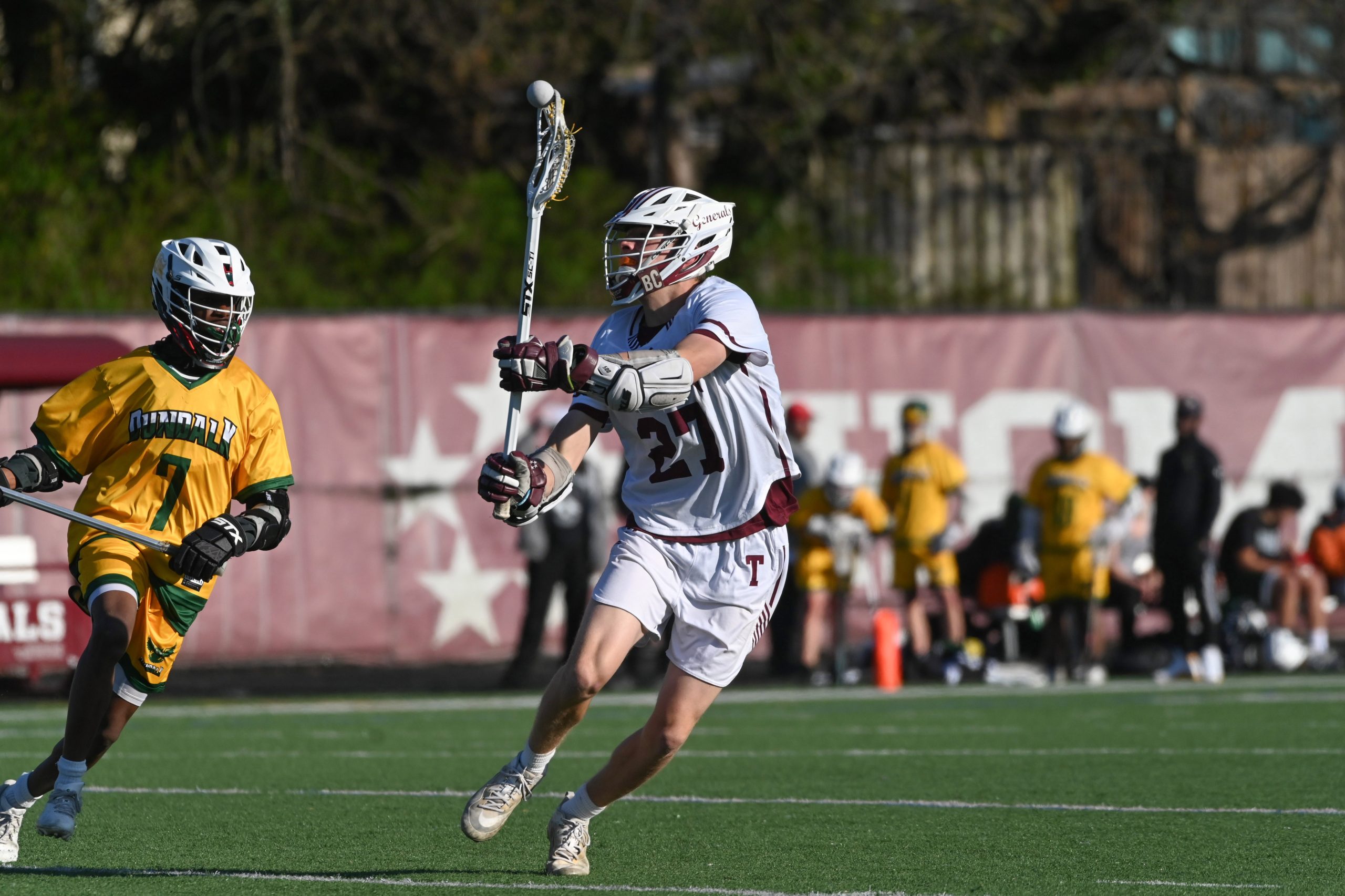 Towson's Hudson Arrup gets off a shot with Dundalk's Marquell...
