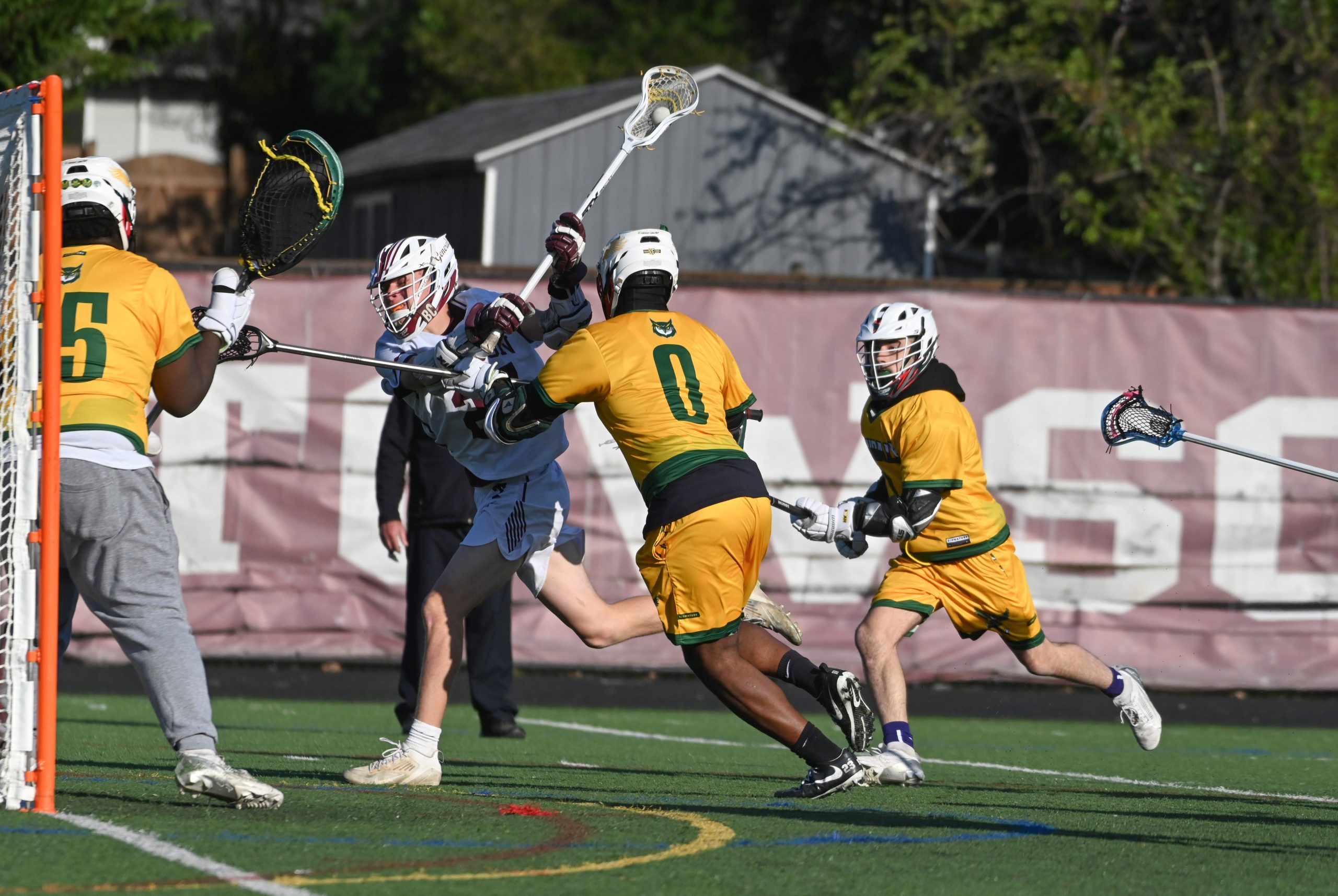 Towson's Hudson Arrup tries to get a shot off with...