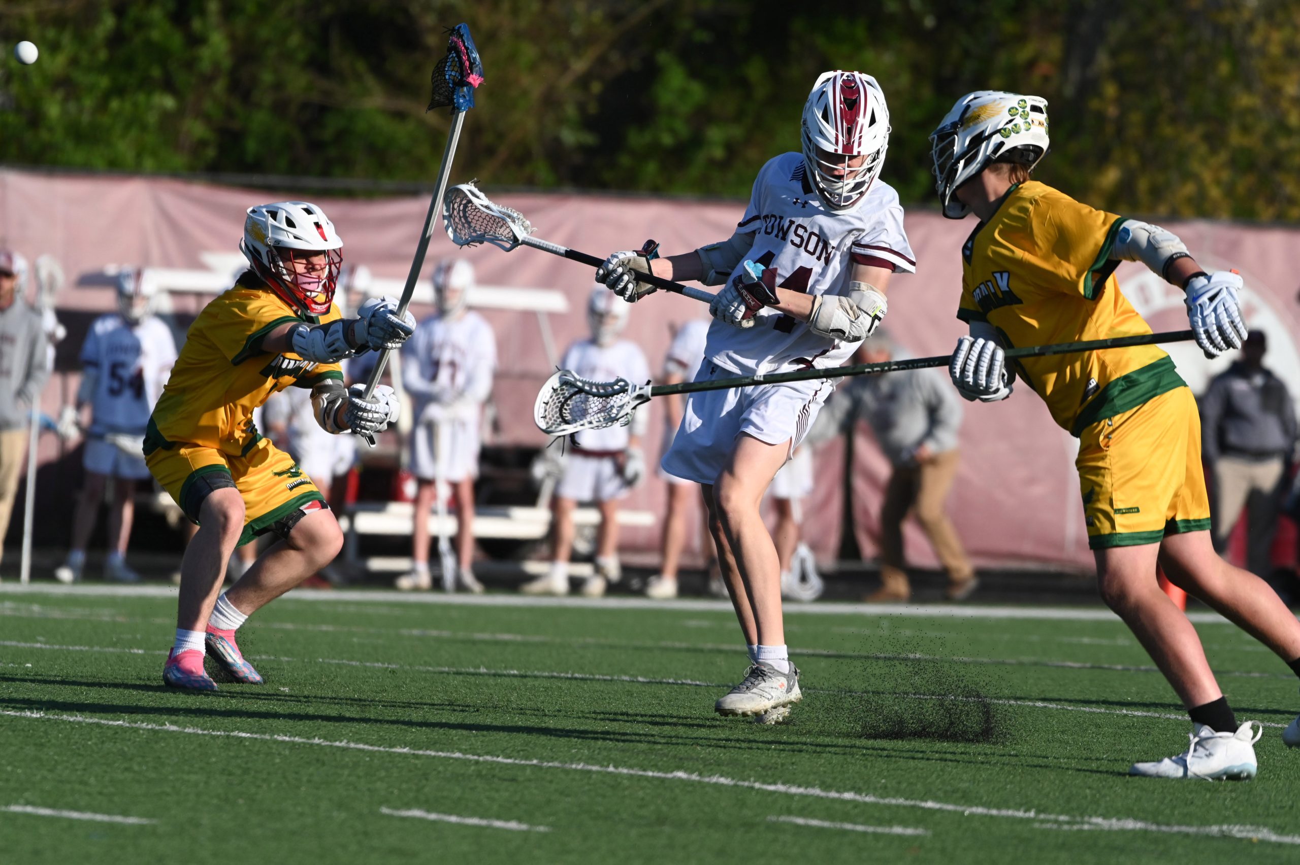 Towson's Douglas Kadan fires a shot for a goal between...
