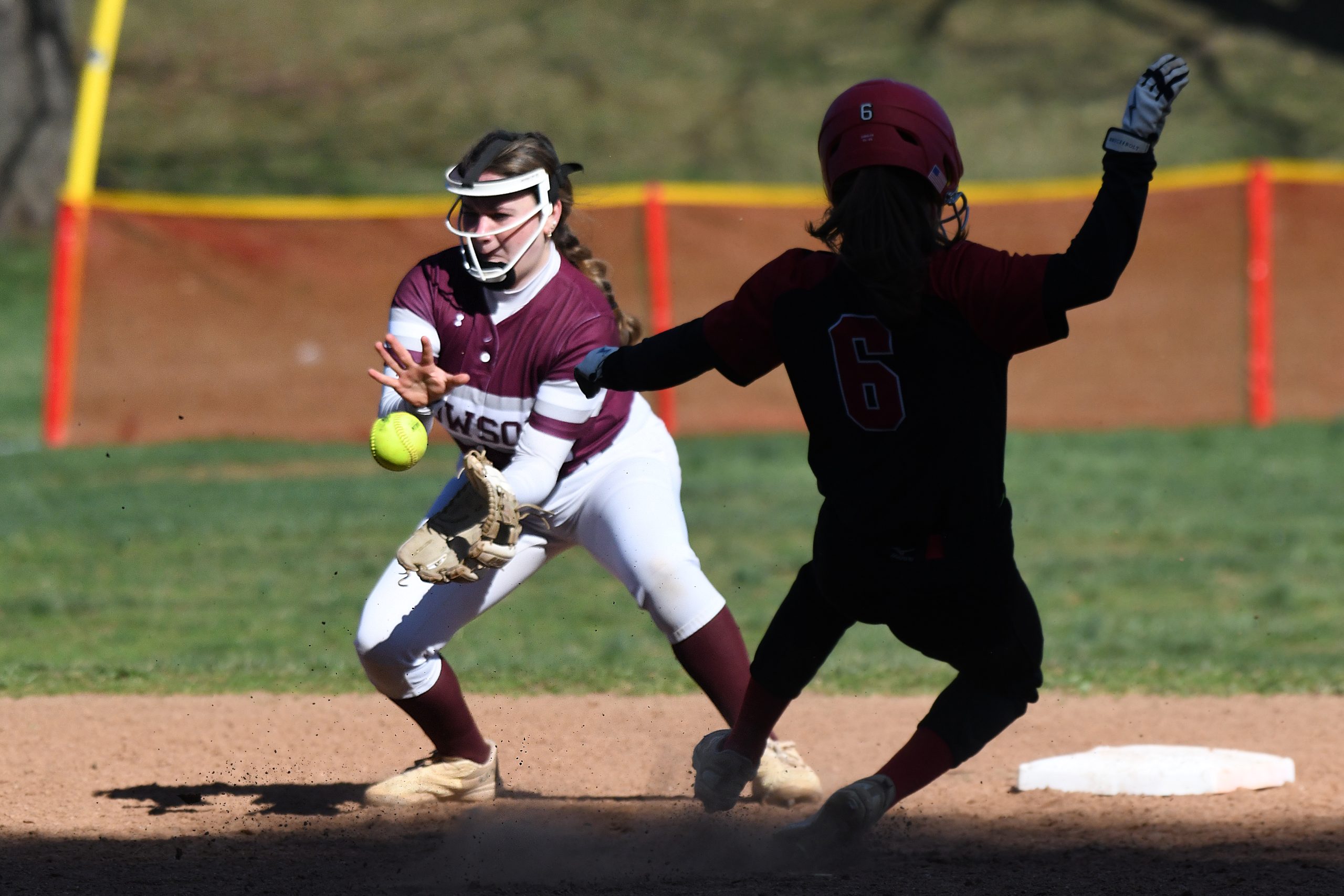Grace Cheevers, Towson, is not able to catch a throw...