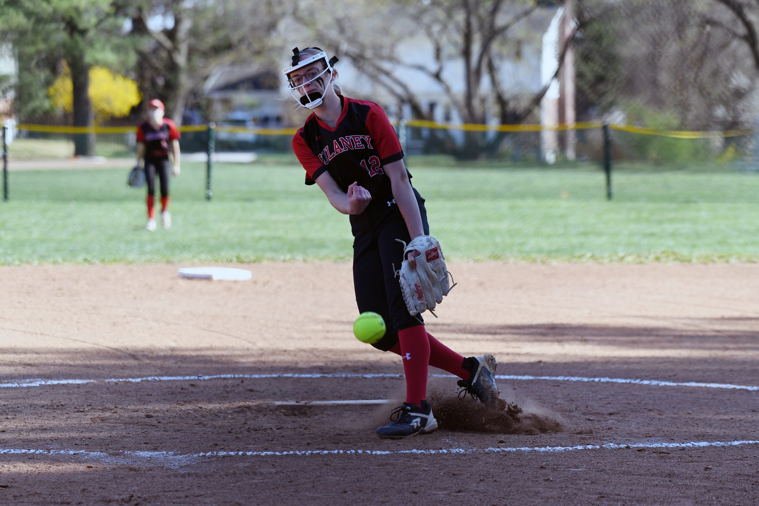 Madison Scruple, Dulaney, pitches against Towson in a softball game...