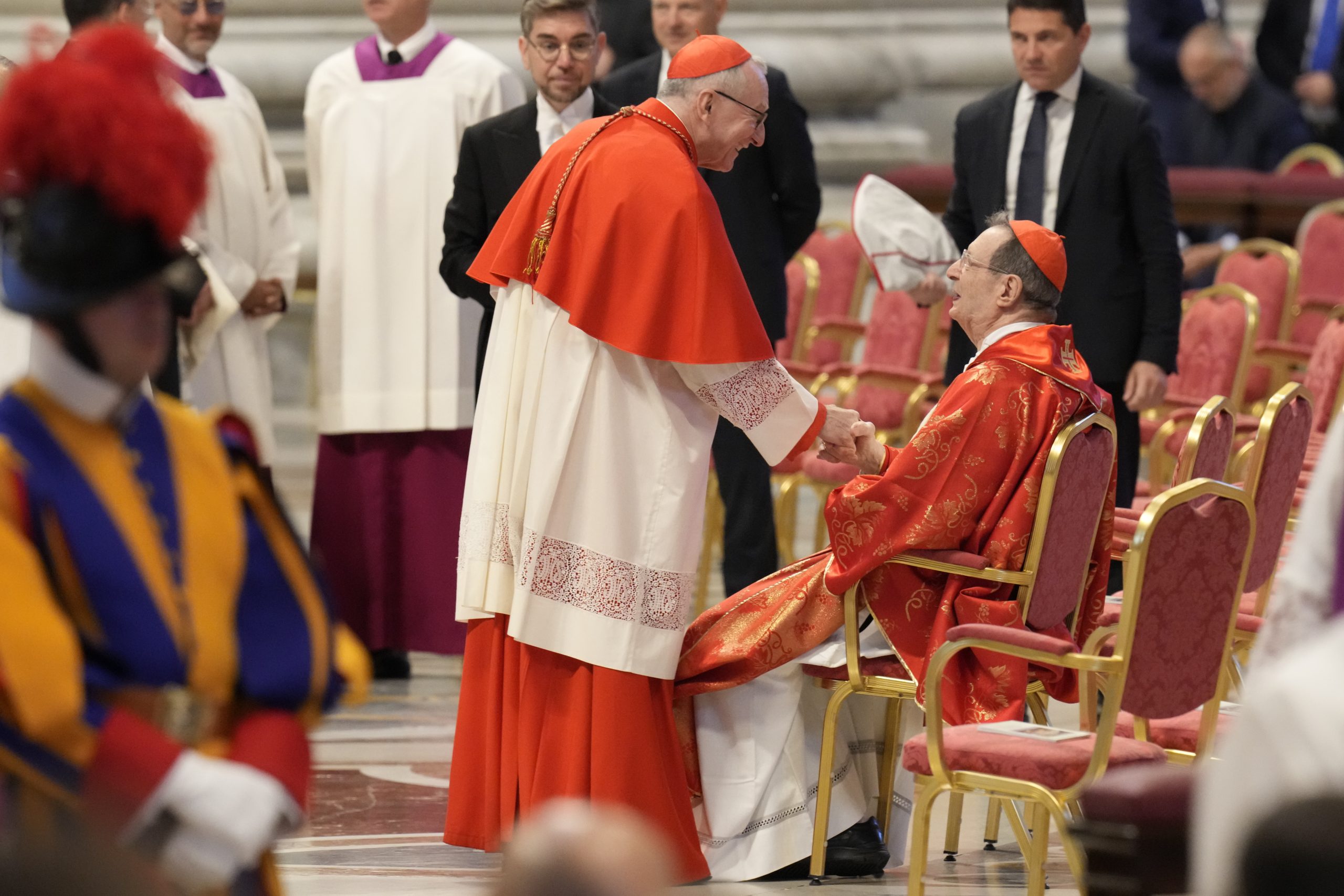 Cardinals greet each other
