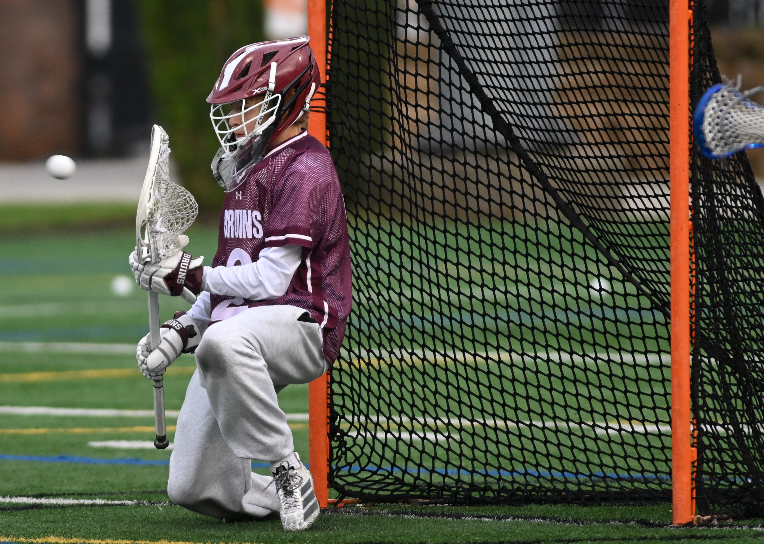 Broadneck goalkeeper Braedon Goloboski makes a play on a ball...
