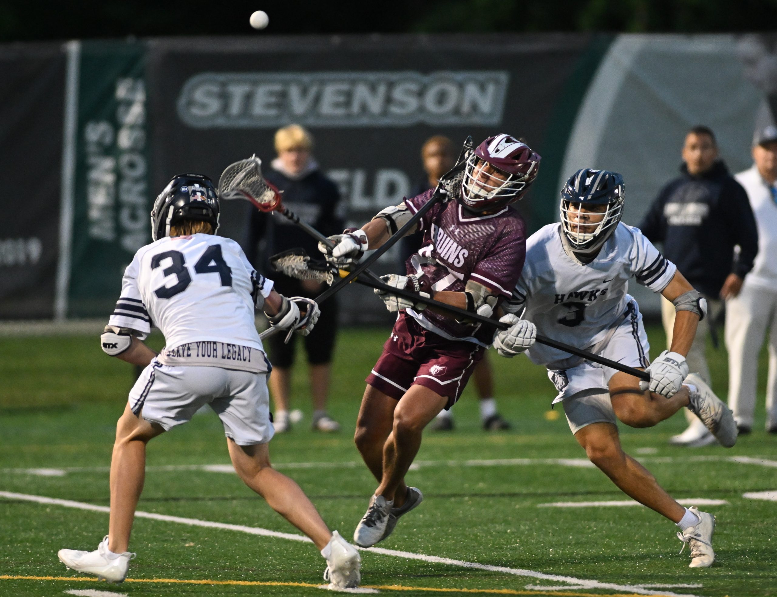 Broadneck’s Brayden Schmidt, center, shoots against Urbana’s Tommy Gotlinger, left,...
