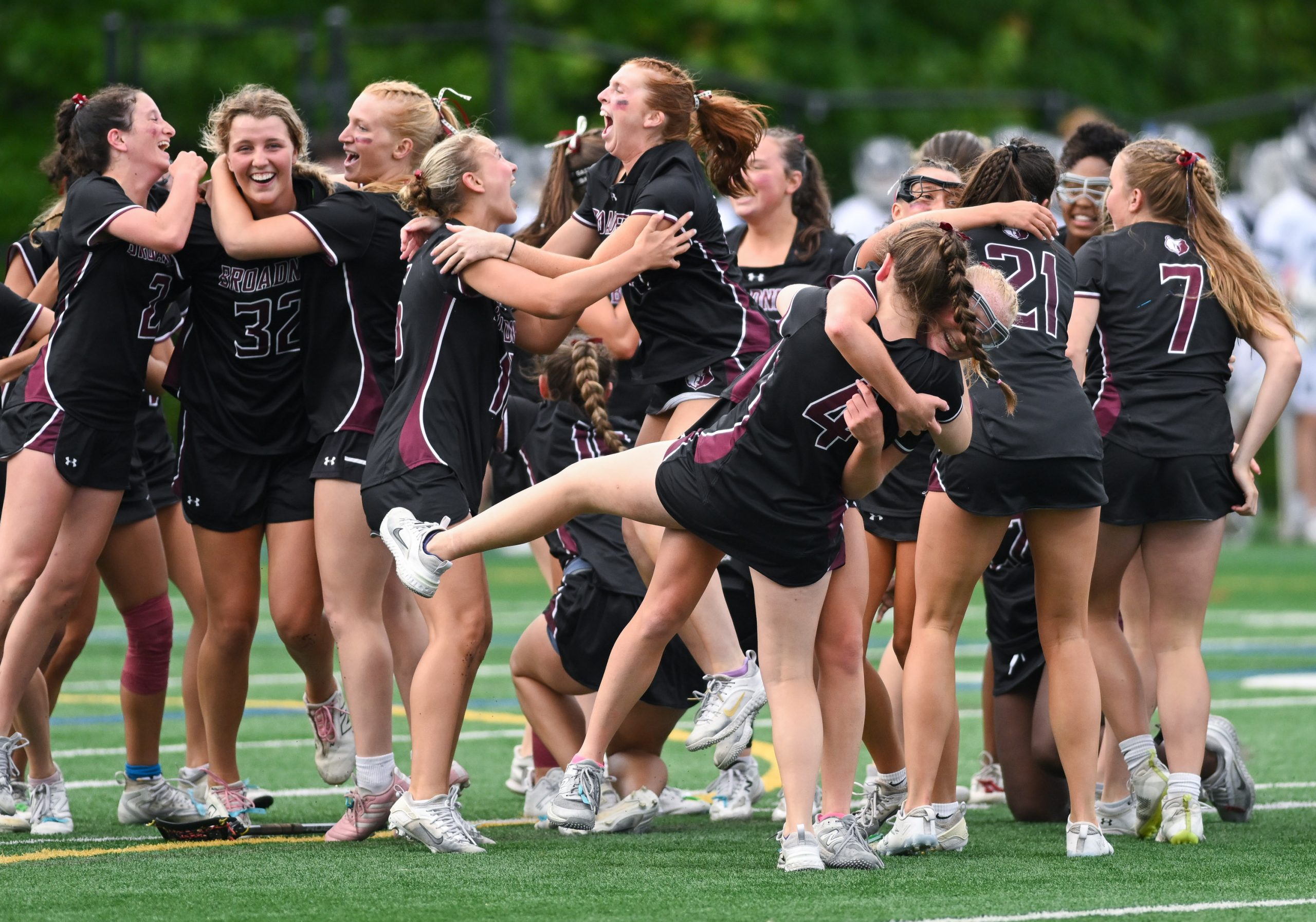 Broadneck celebrates their 8-6 win against Urbana in the girls...