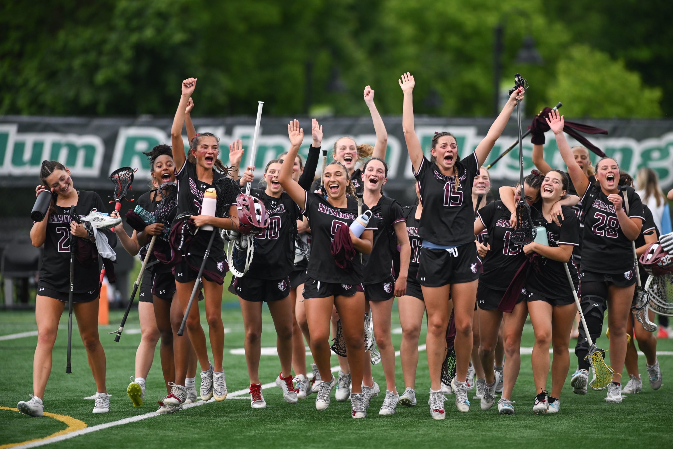 Broadneck celebrates their 8-6 win against Urbana in the girls...