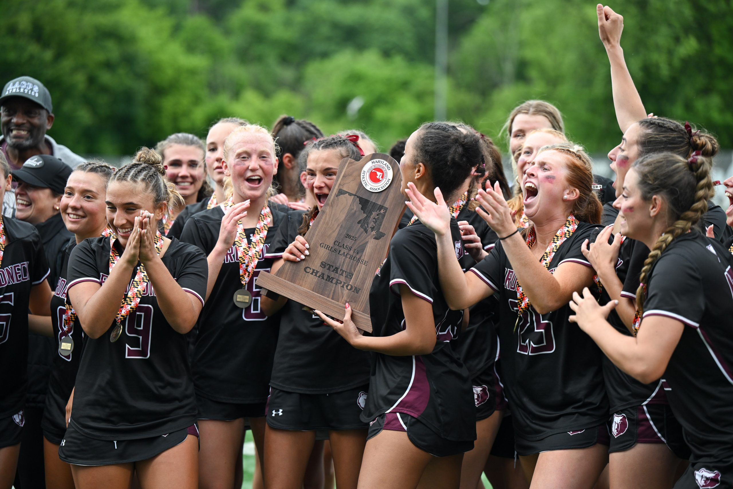 Broadneck celebrates their 8-6 win against Urbana in the girls...