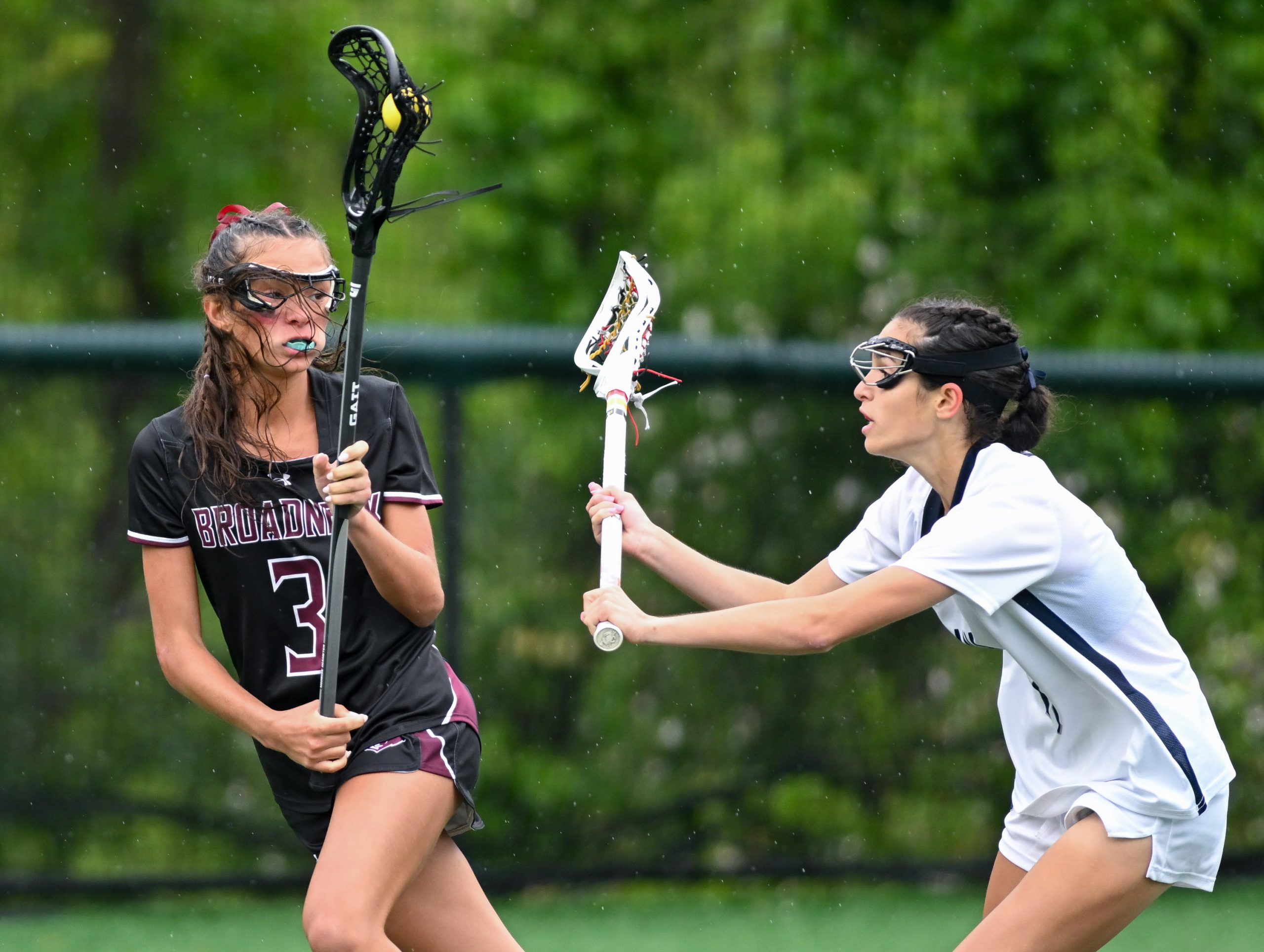 Broadneck’s Sienna Miller, left, works against Urbana’s Reese Paul in...