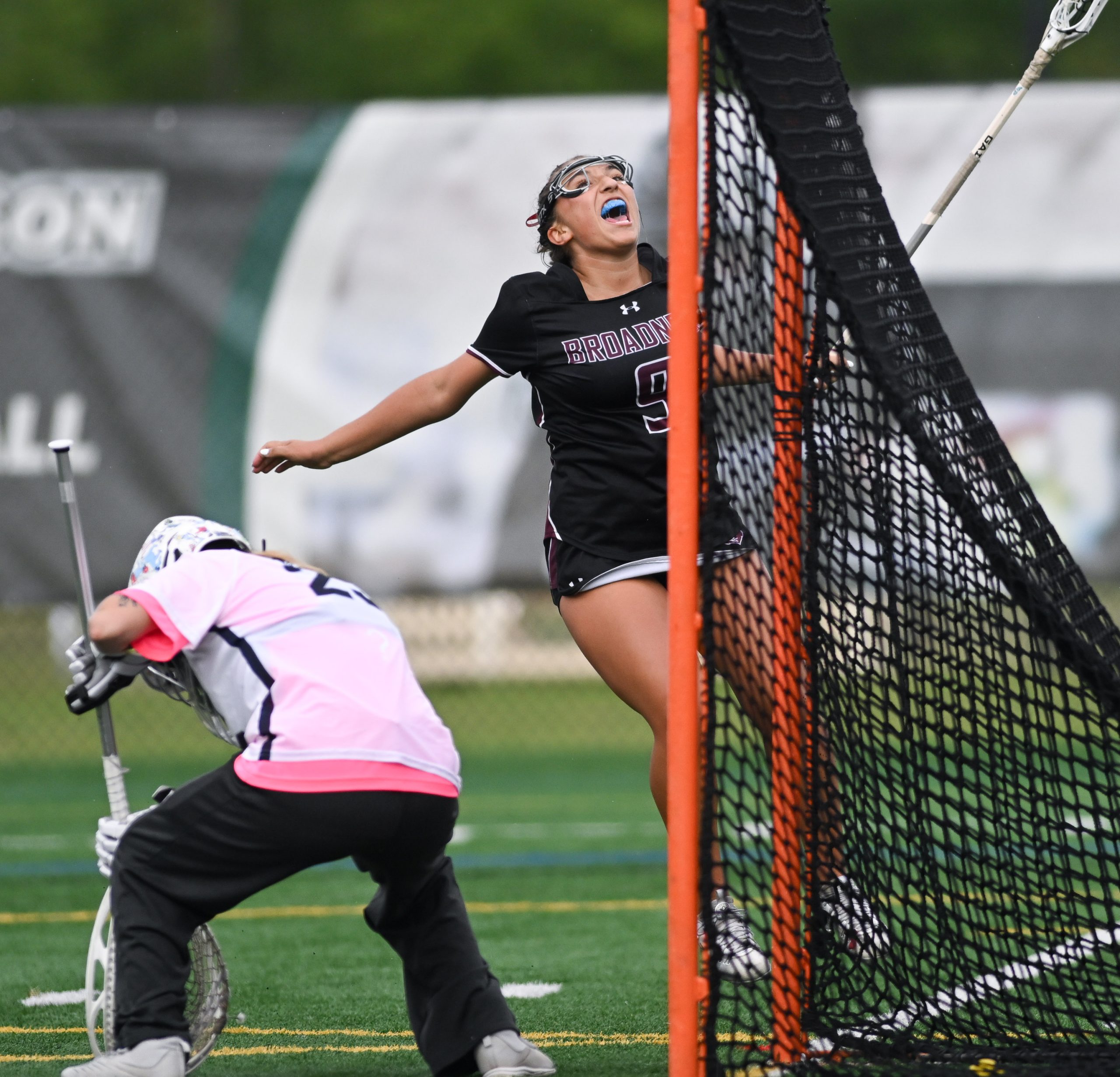Broadneck’s Ceci Facciponti, right, celebrates after scoring against Urbana goalkeeper...