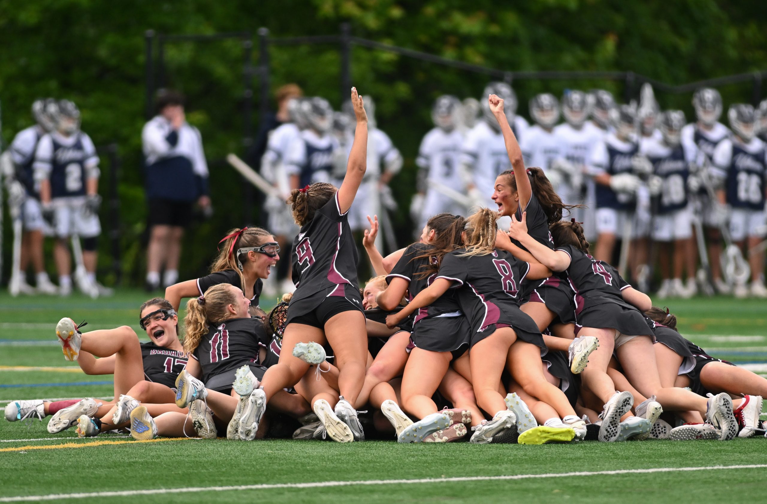Broadneck celebrates their 8-6 win against Urbana in the girls...