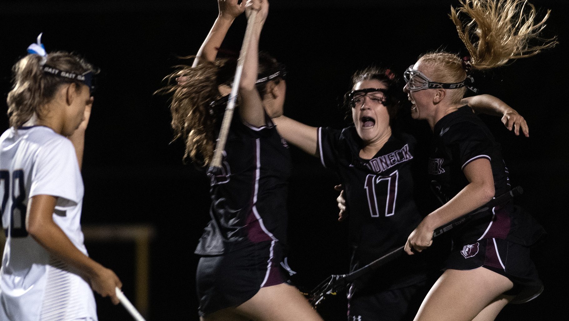 From left, Broadneck's Charlotte Robertson, Nora Lopes and Raleigh Kerst...