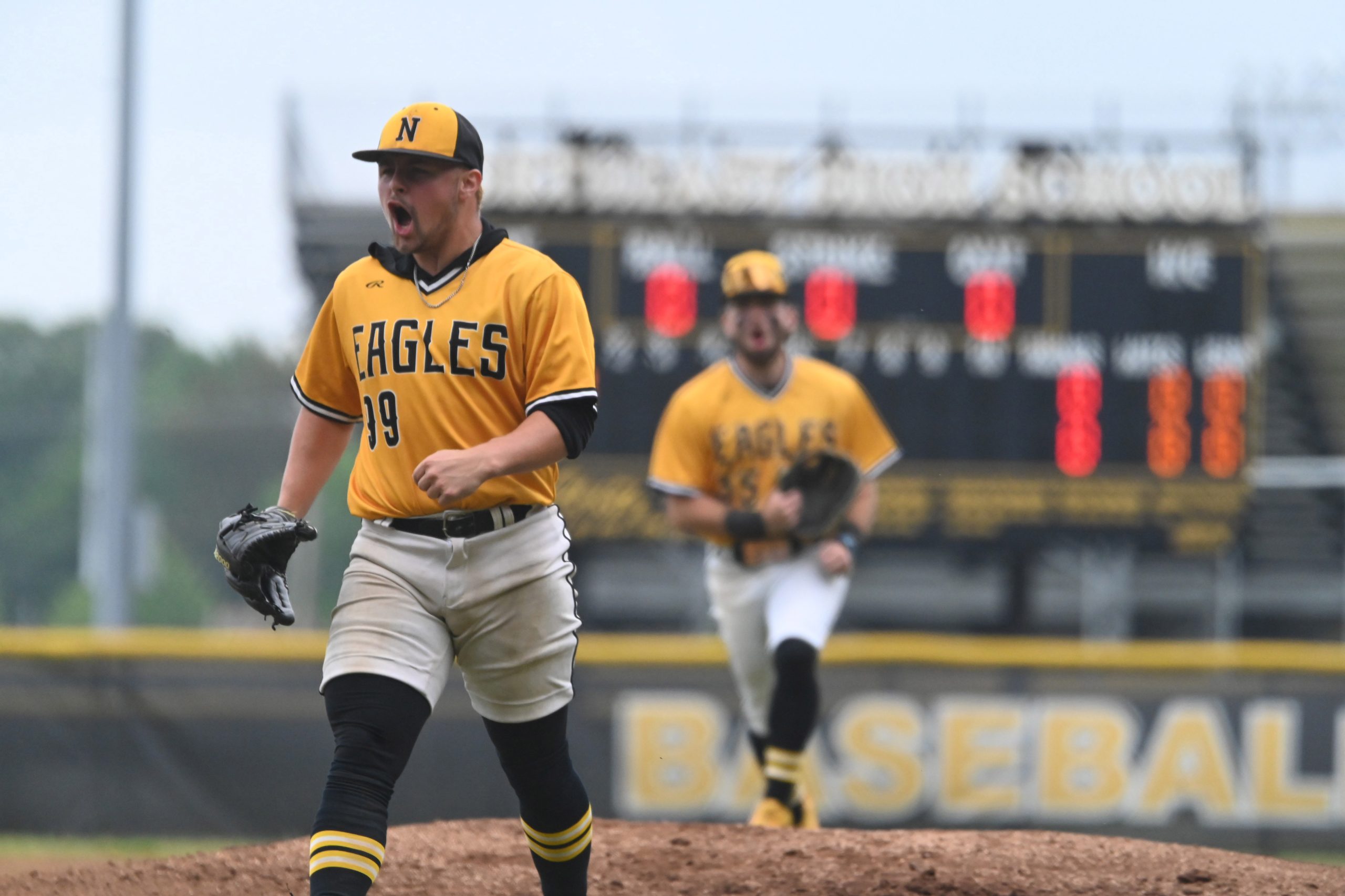Northeast’s Jayden Saraullo celebrates a 3-up 3-down 1st inning against...