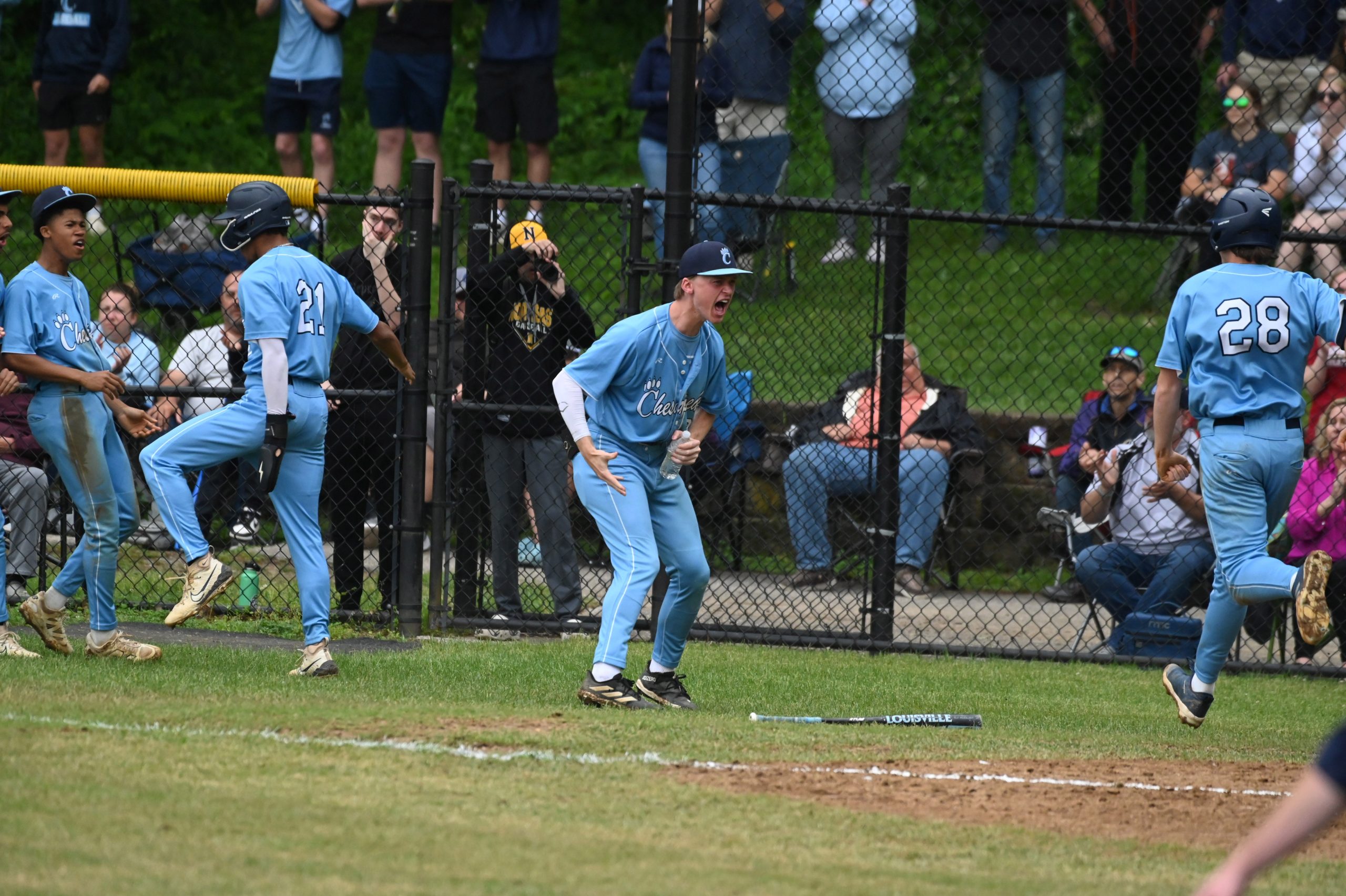 Chesapeake’s Dennis Bailey #21 and Griffin Ochiltree #28 celebrate scoring...