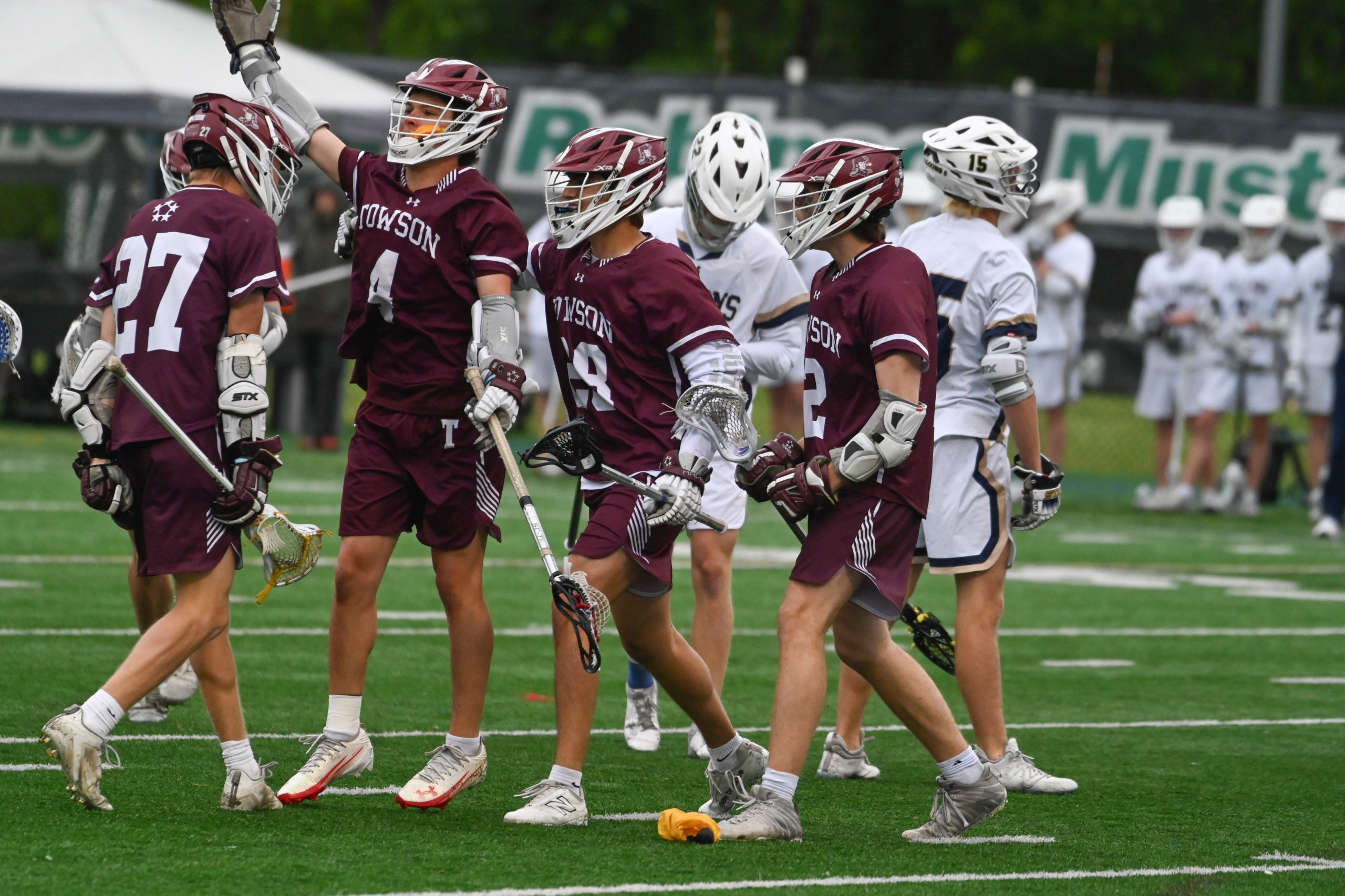 Towson’s Brody Donovan #4 celebrates a goal against Severna Park...
