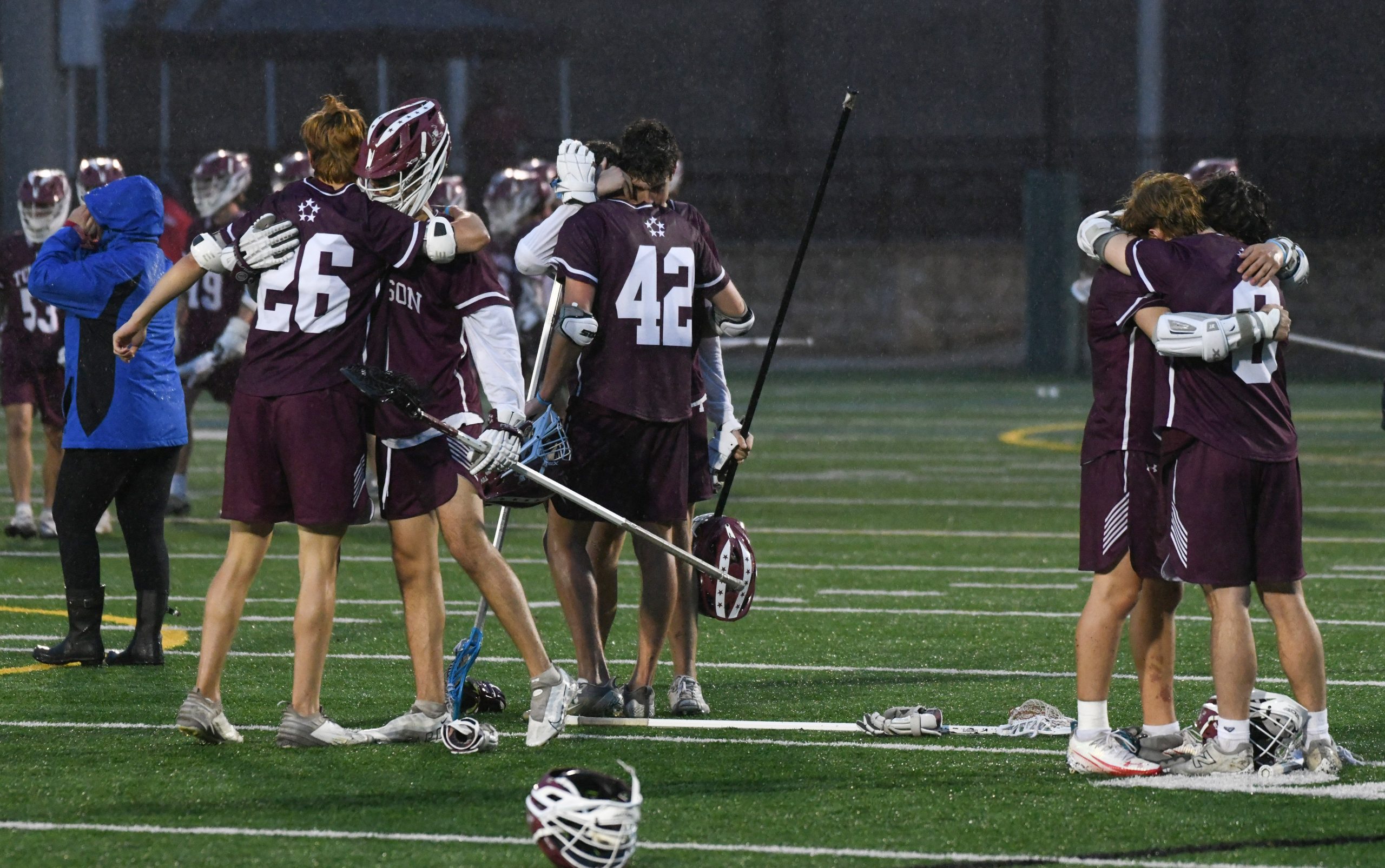 Towson players console each other after their loss during the...