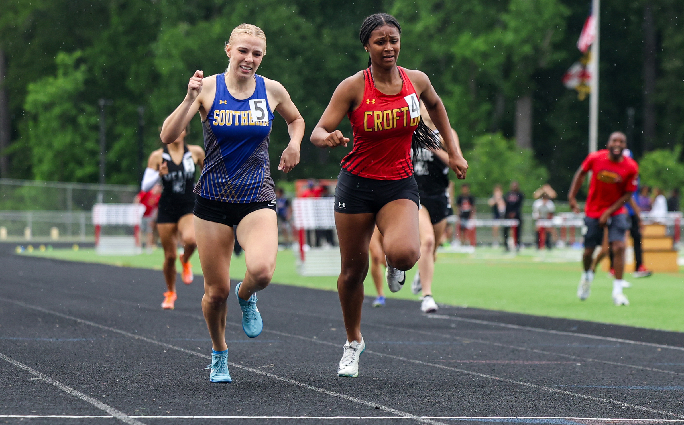 Rebecca Burgee, Southern, and Laila Carpenter, Crofton, at the finish...