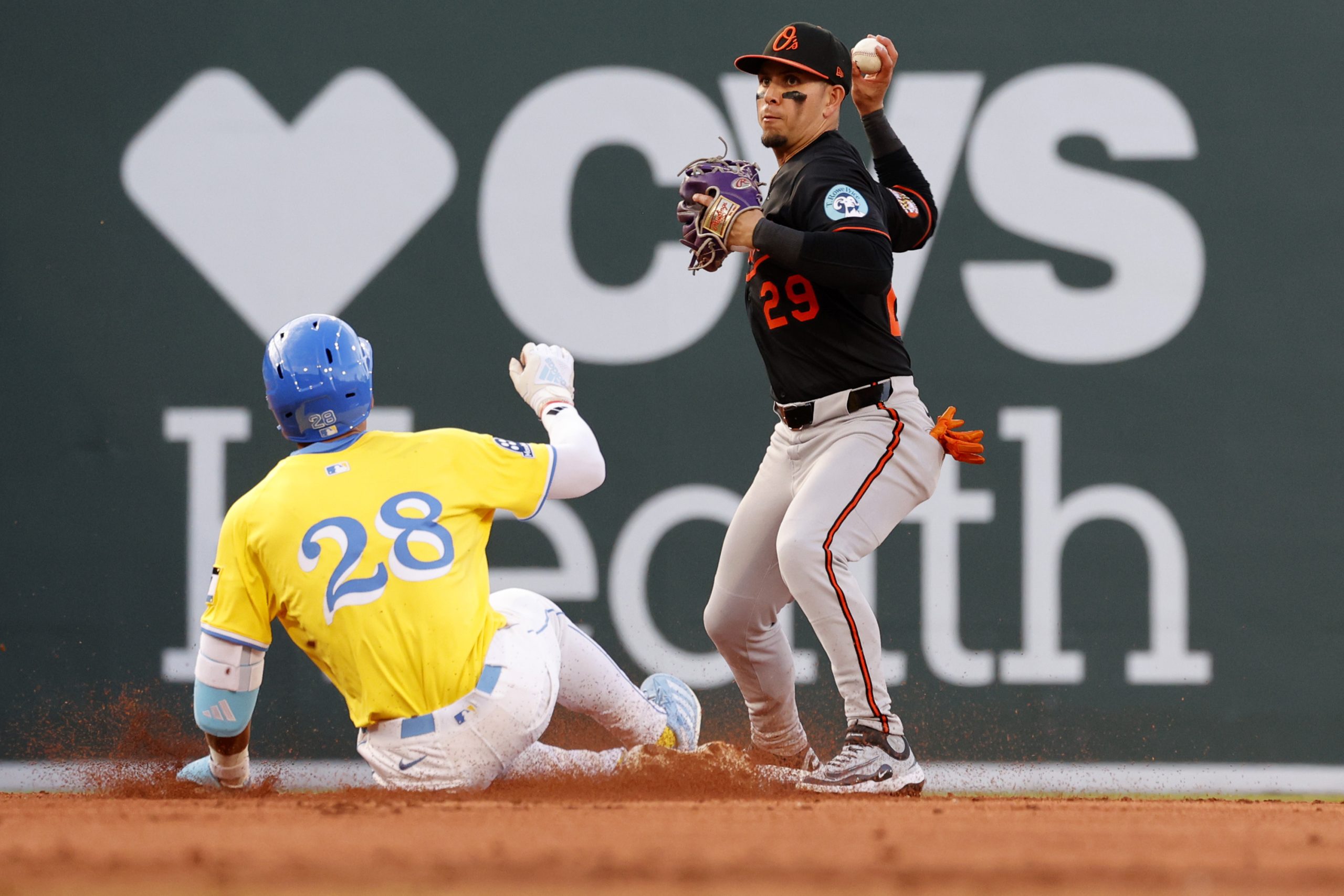 Boston Red Sox's Kristian Campbell (28) is forced out at...