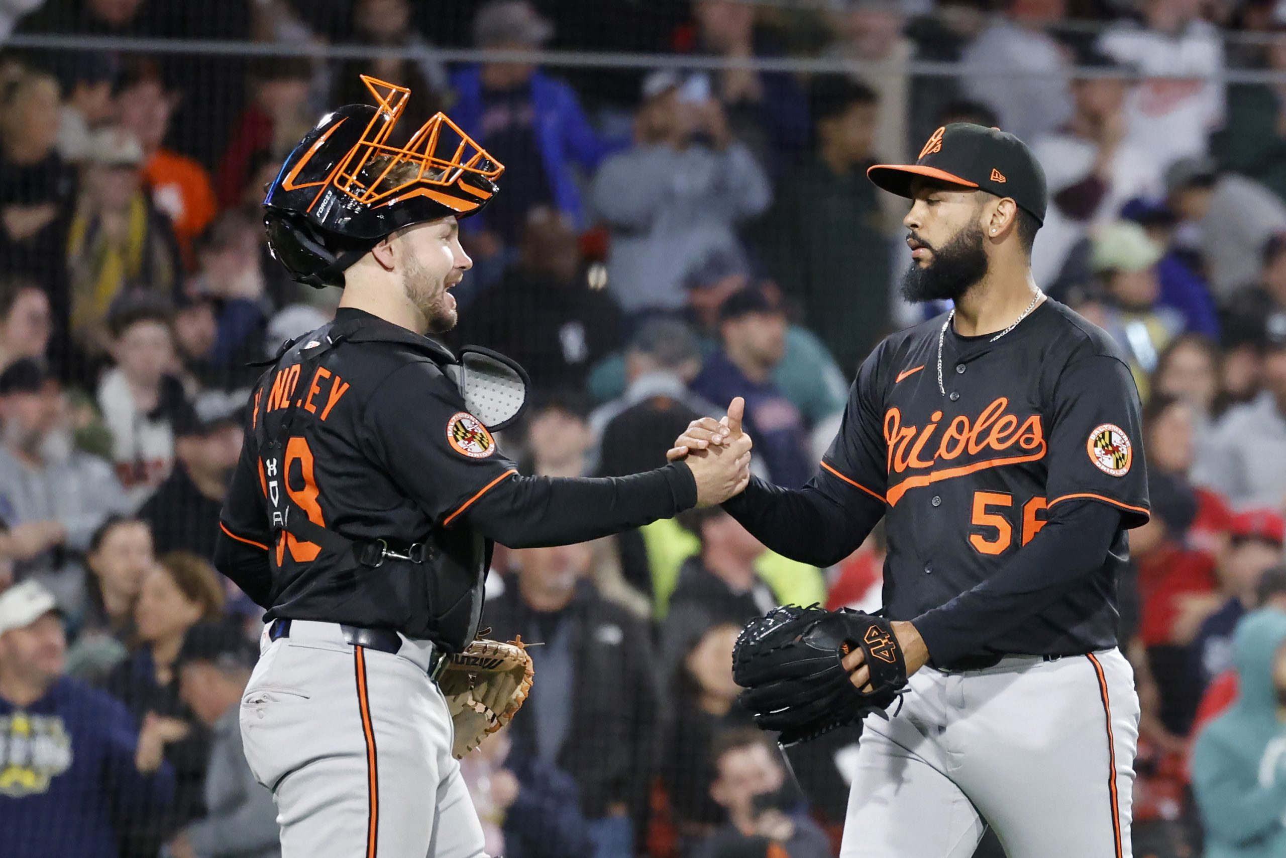 Baltimore Orioles pitcher Seranthony Dominguez (56) is congratulated by catcher...