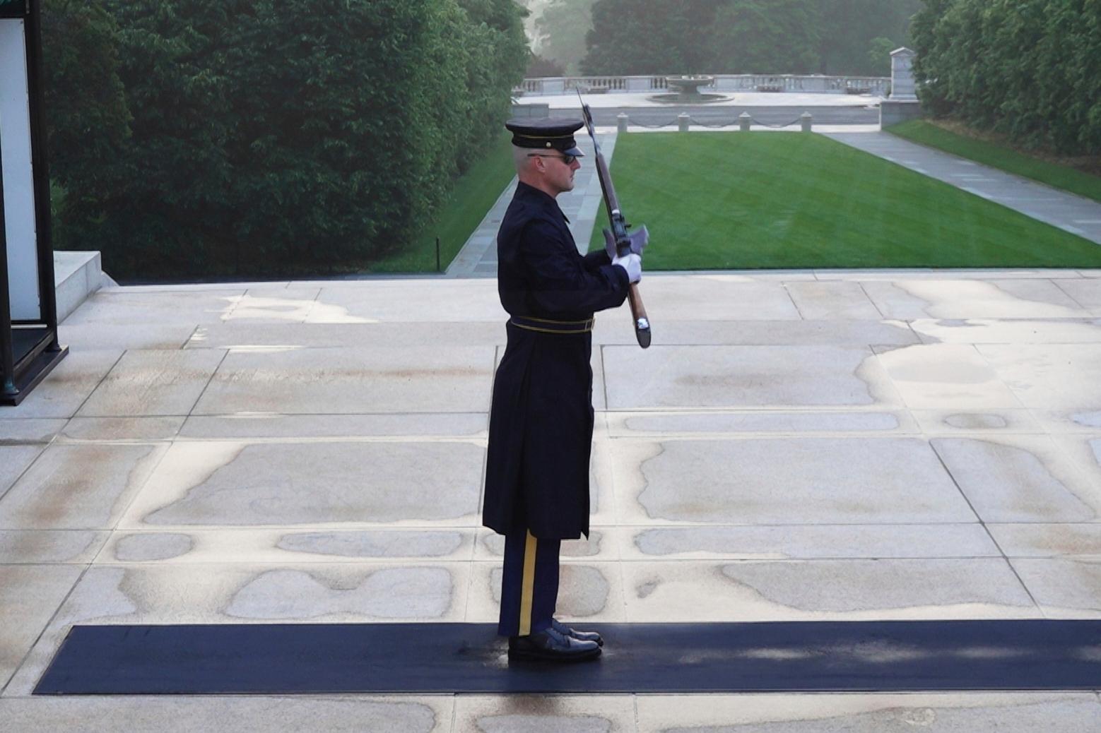 Army Sgt. 1st Class Andrew Jay patrols the Tomb of...