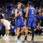 Orlando Magic forward Franz Wagner (22) and forward Paolo Banchero (5) celebrate after a basket against the Cleveland Cavaliers in the third quarter during game four of the first round for the 2024 NBA playoffs at Kia Center.