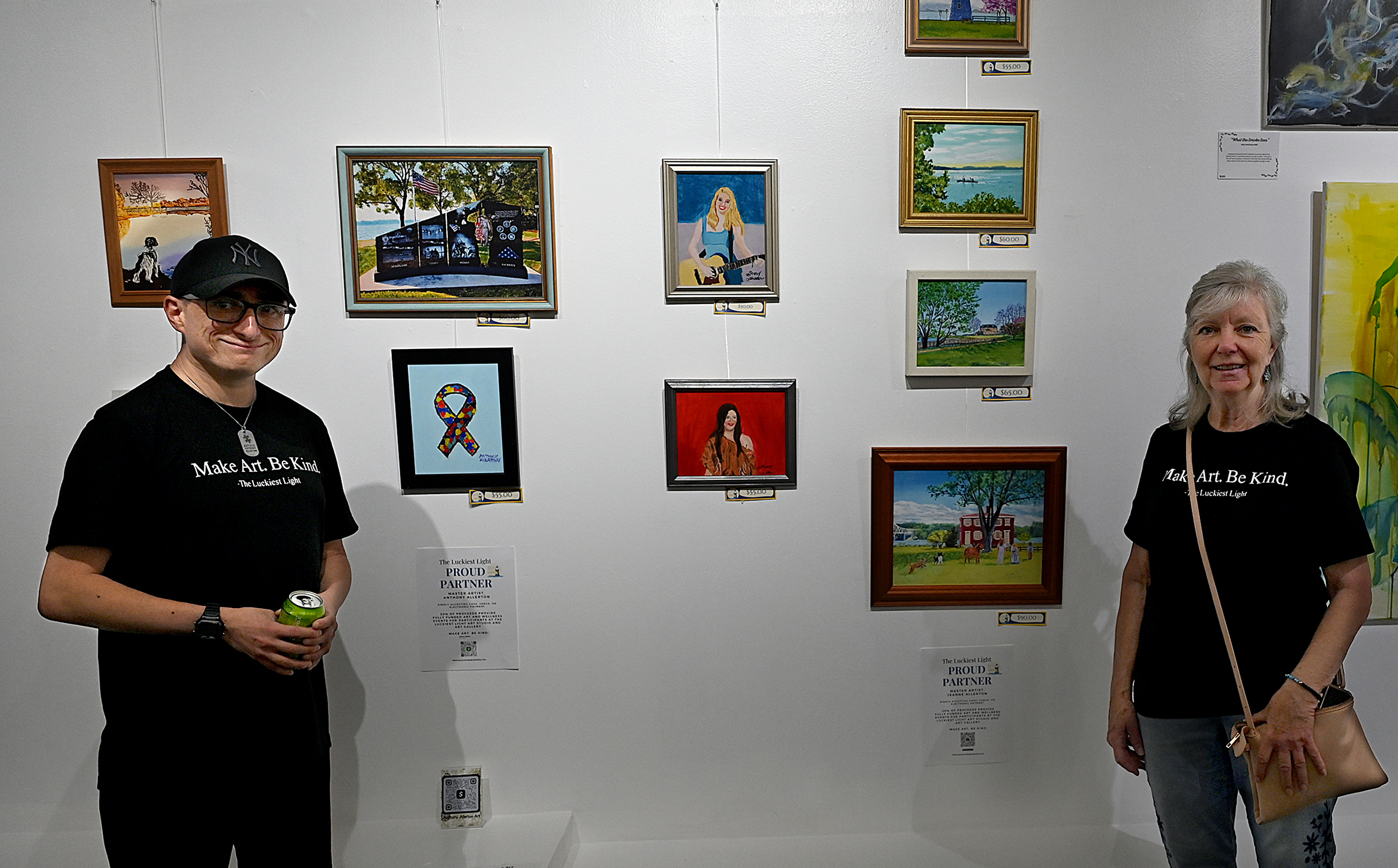 Son and mother artists, Anthony Allerton and JeannieAllerton, stand in...