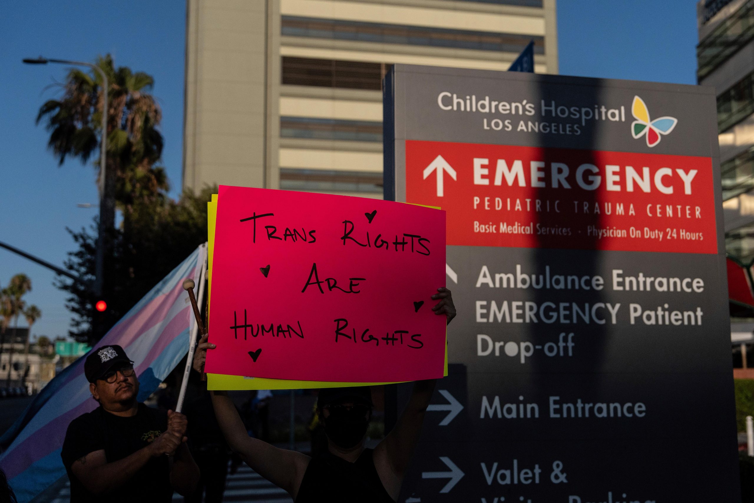 Protesters demonstrate against the planned closure of the trans youth...