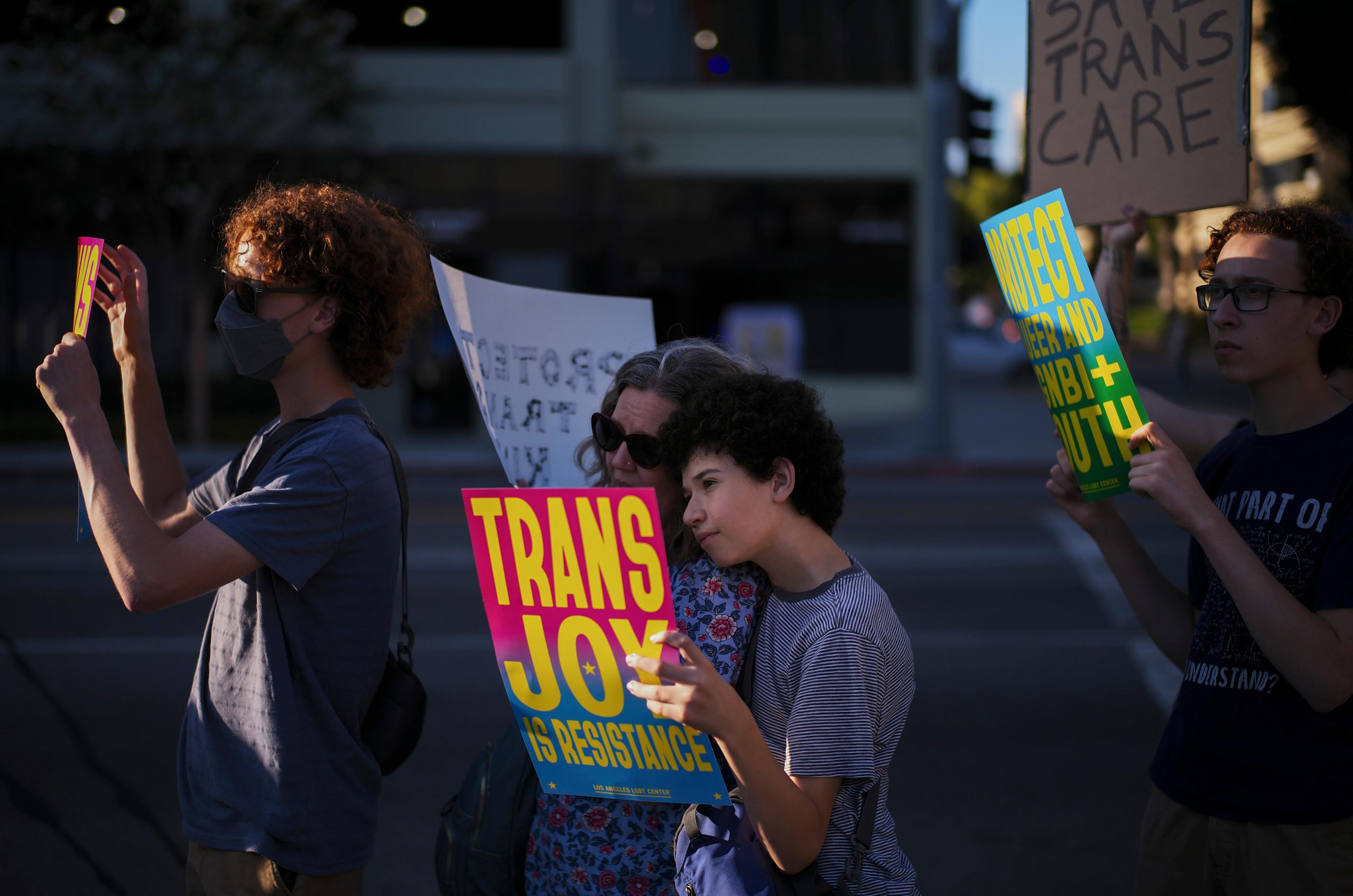 Lindsey Nelson, center left, and her son, Max Deiner, take...