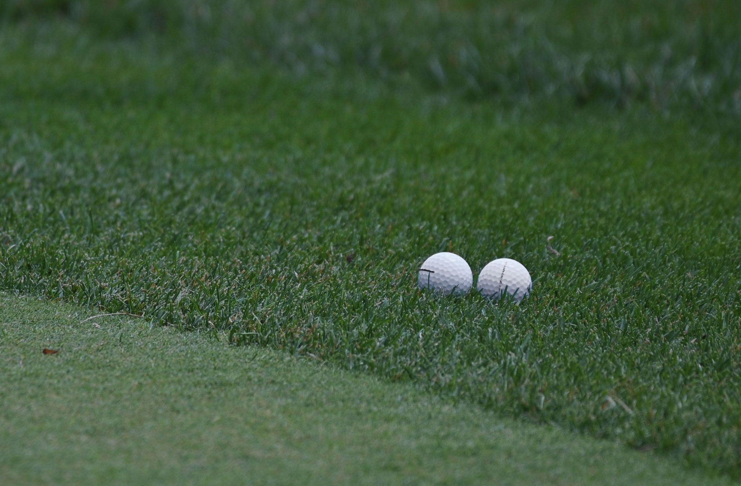 The second approach shots to the ninth hole by golfers...