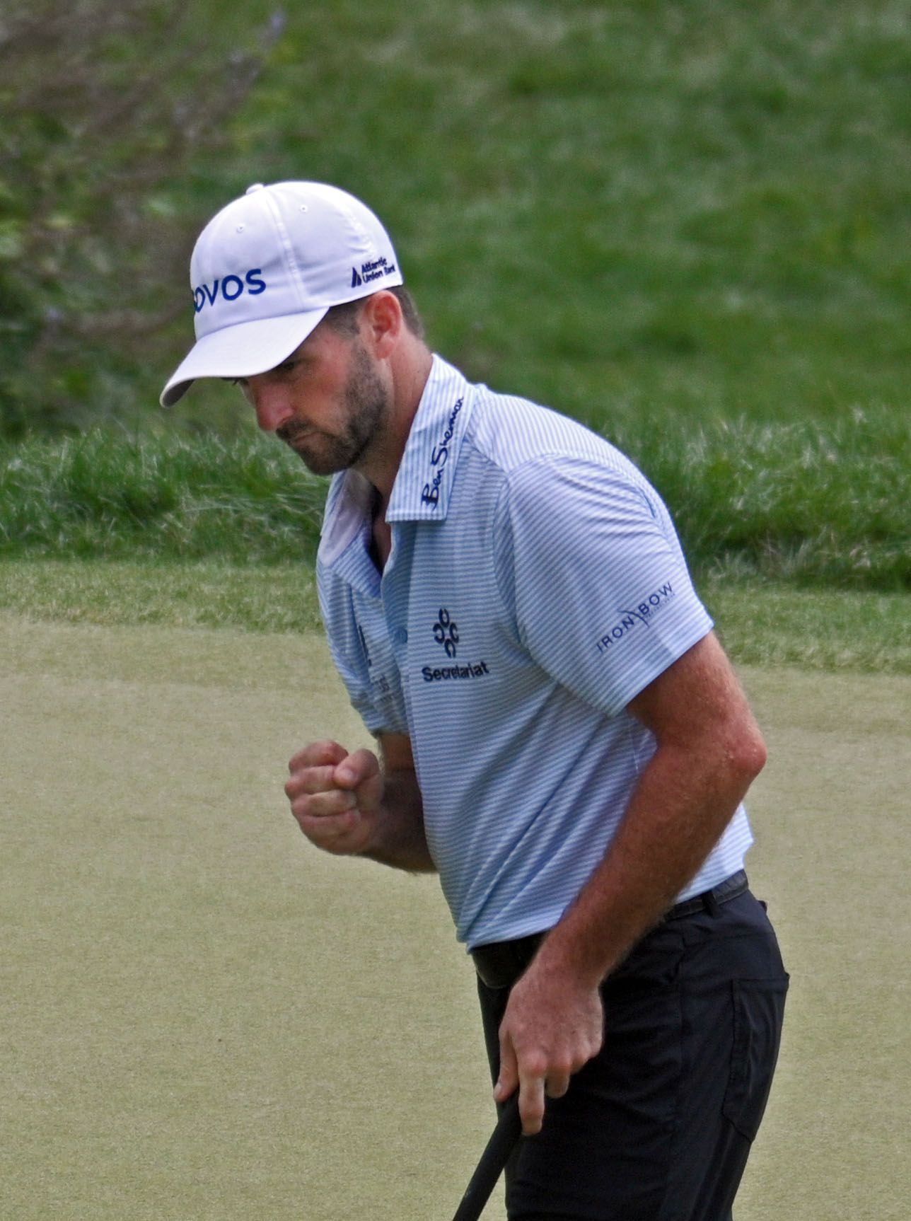 Denny McCarthy, of Rockville, Md., reacts after birdieing the 18th...