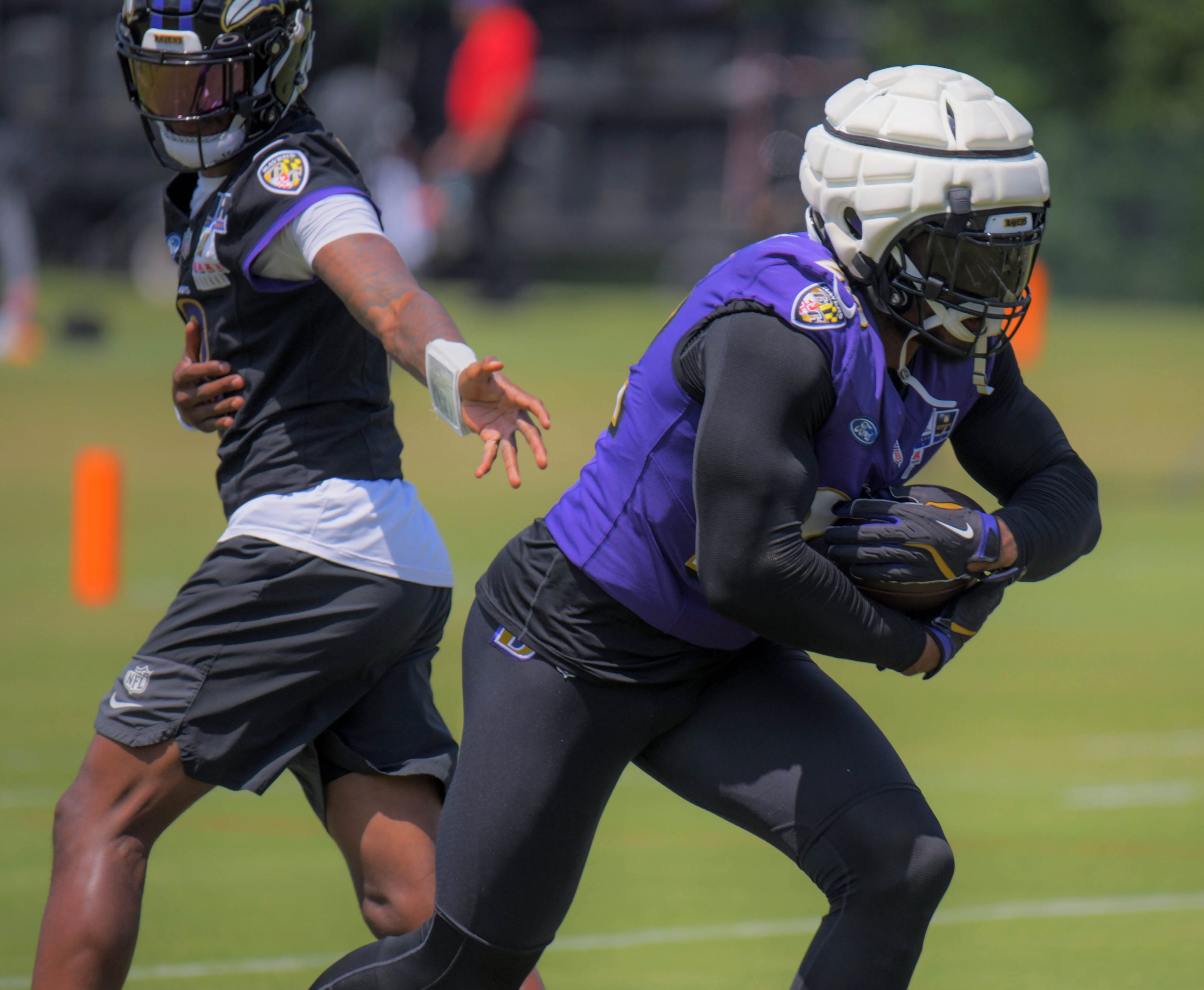 Baltimore Ravens running back Derrick Henry runs with a handoff...