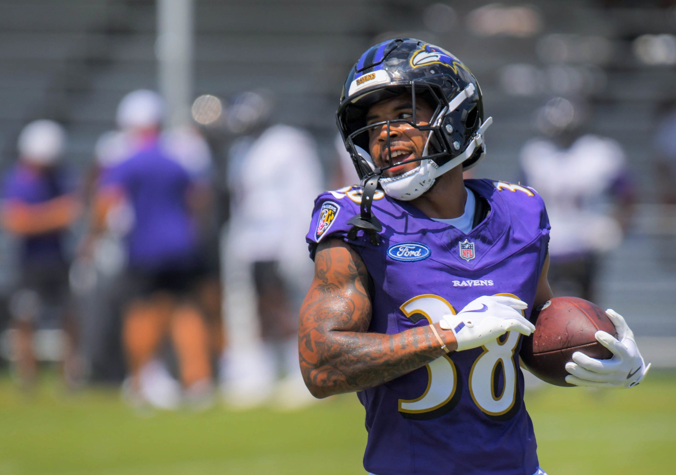Baltimore Ravens running back Myles Gaskin smiles during practice at...