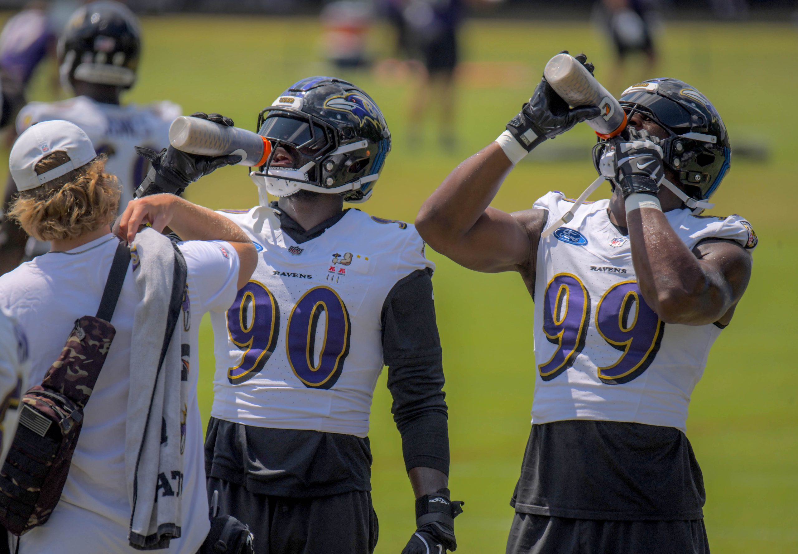 Baltimore Ravens outside linebackers David Ojabo #90 and Odafe Oweh...