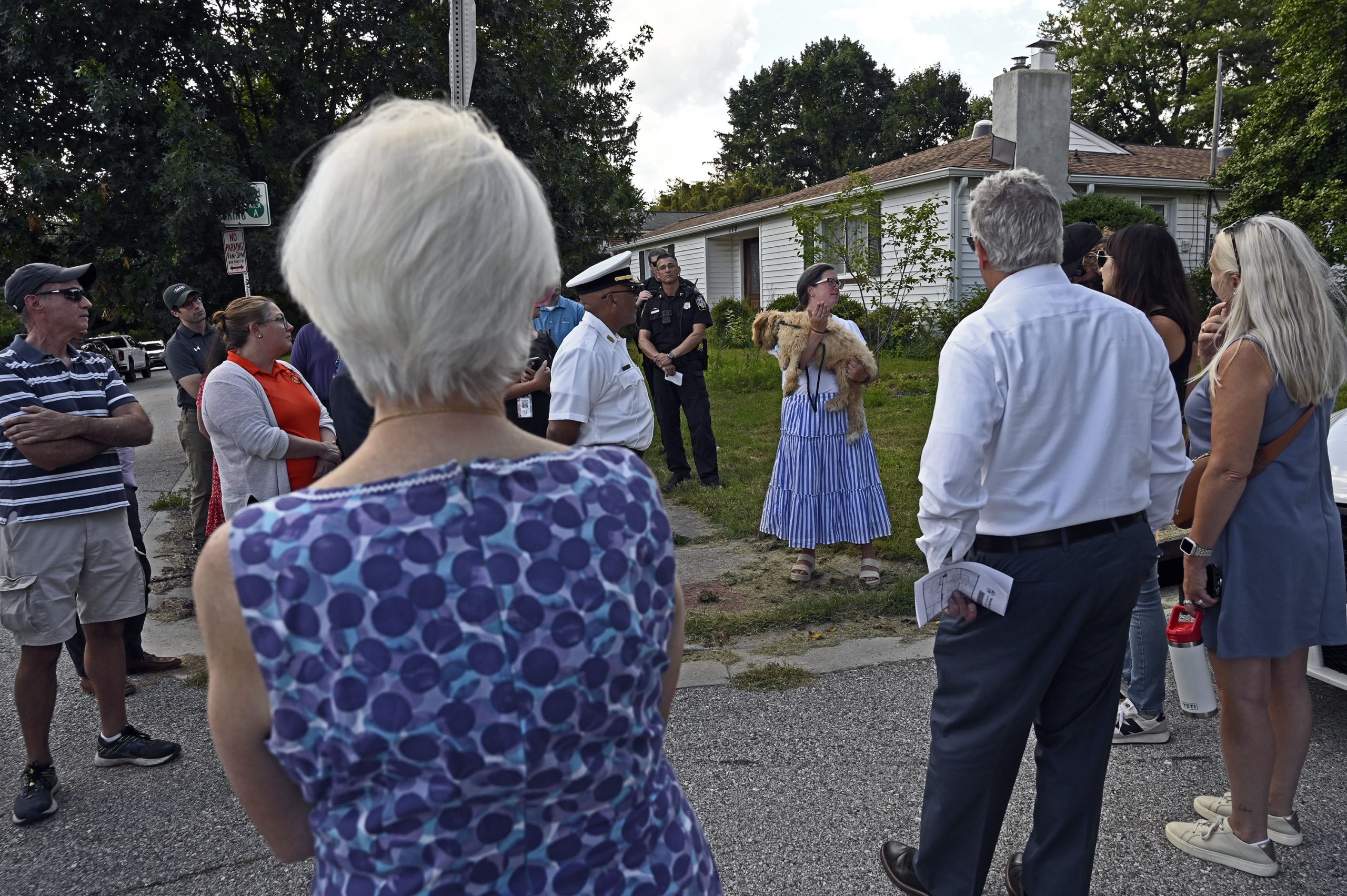 Towson resident Colleen McElroy, center, talks with County Executive Kathy...