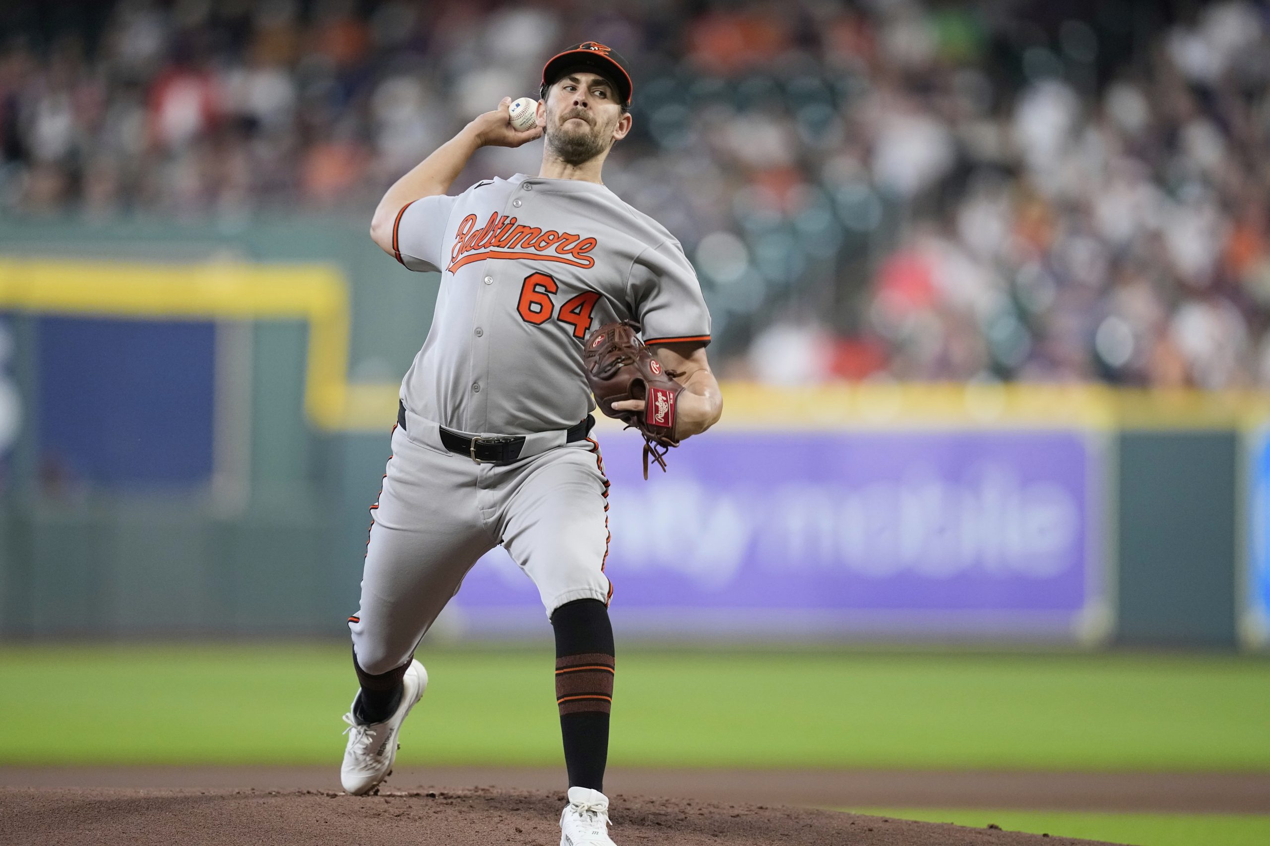 Baltimore Orioles starting pitcher Dean Kremer throws against the Houston...