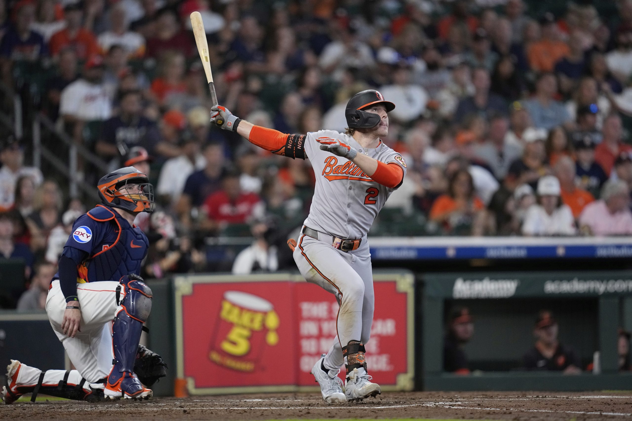 Baltimore Orioles' Gunnar Henderson (2) hits a sacrifice fly as...