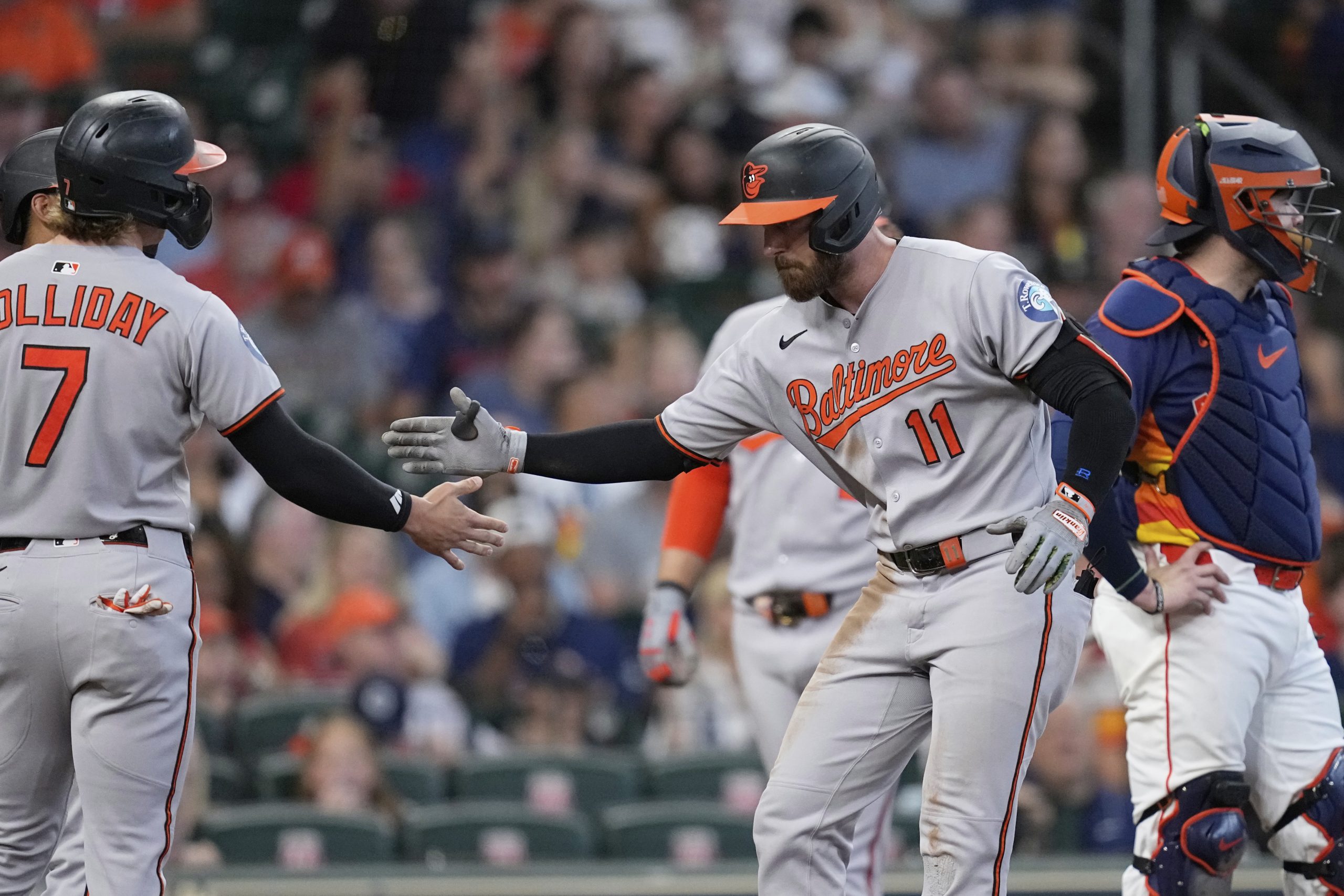 Baltimore Orioles' Jordan Westburg (11) celebrates with Jackson Holliday (7)...
