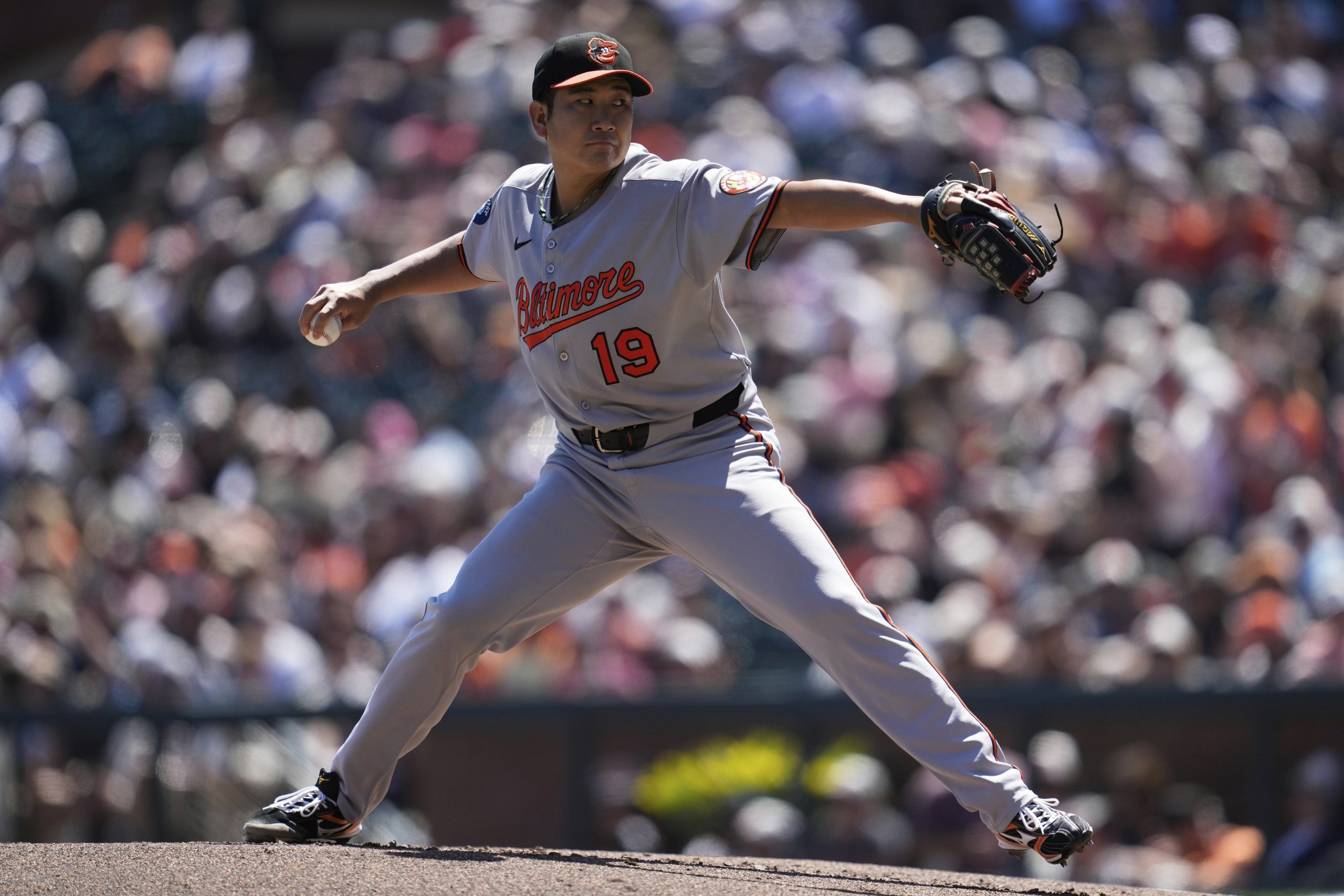 Baltimore Orioles pitcher Tomoyuki Sugano (19) throws against the San...