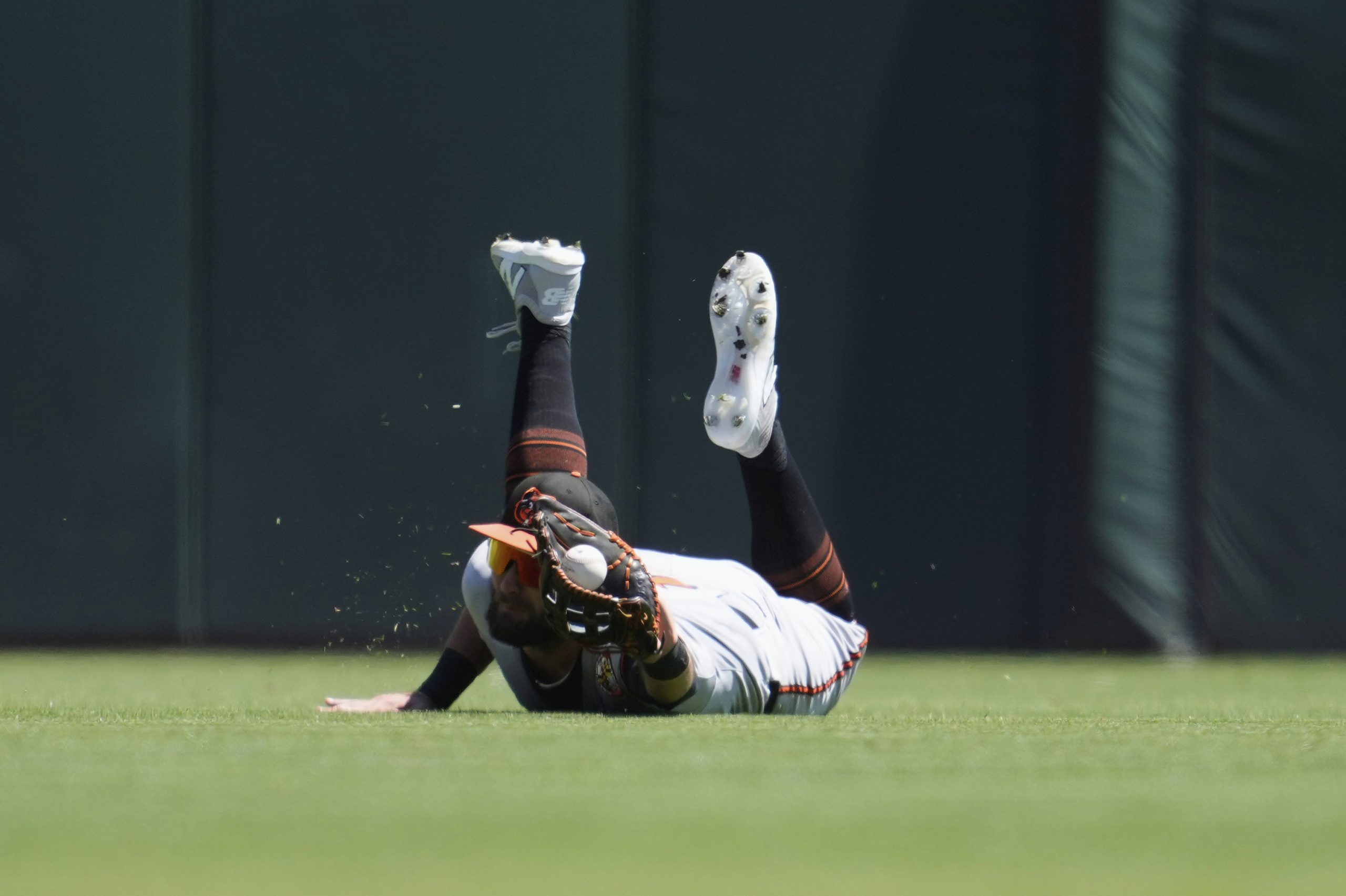 Baltimore Orioles center fielder Colton Cowser catches fly out hit...