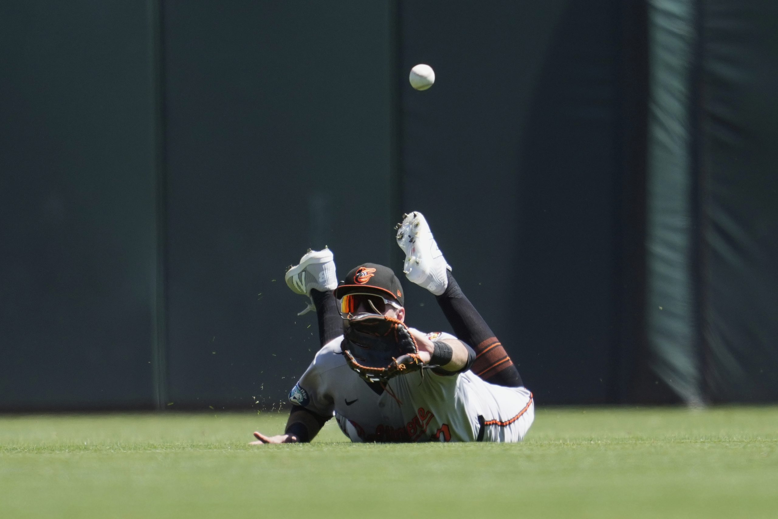 Orioles center fielder Colton Cowser makes a diving catch in...