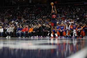 Dec 28, 2024; Washington, District of Columbia, USA; Washington Wizards forward Justin Champagnie (9) shoots the ball against the New York Knicks in the fourth quarter at Capital One Arena.