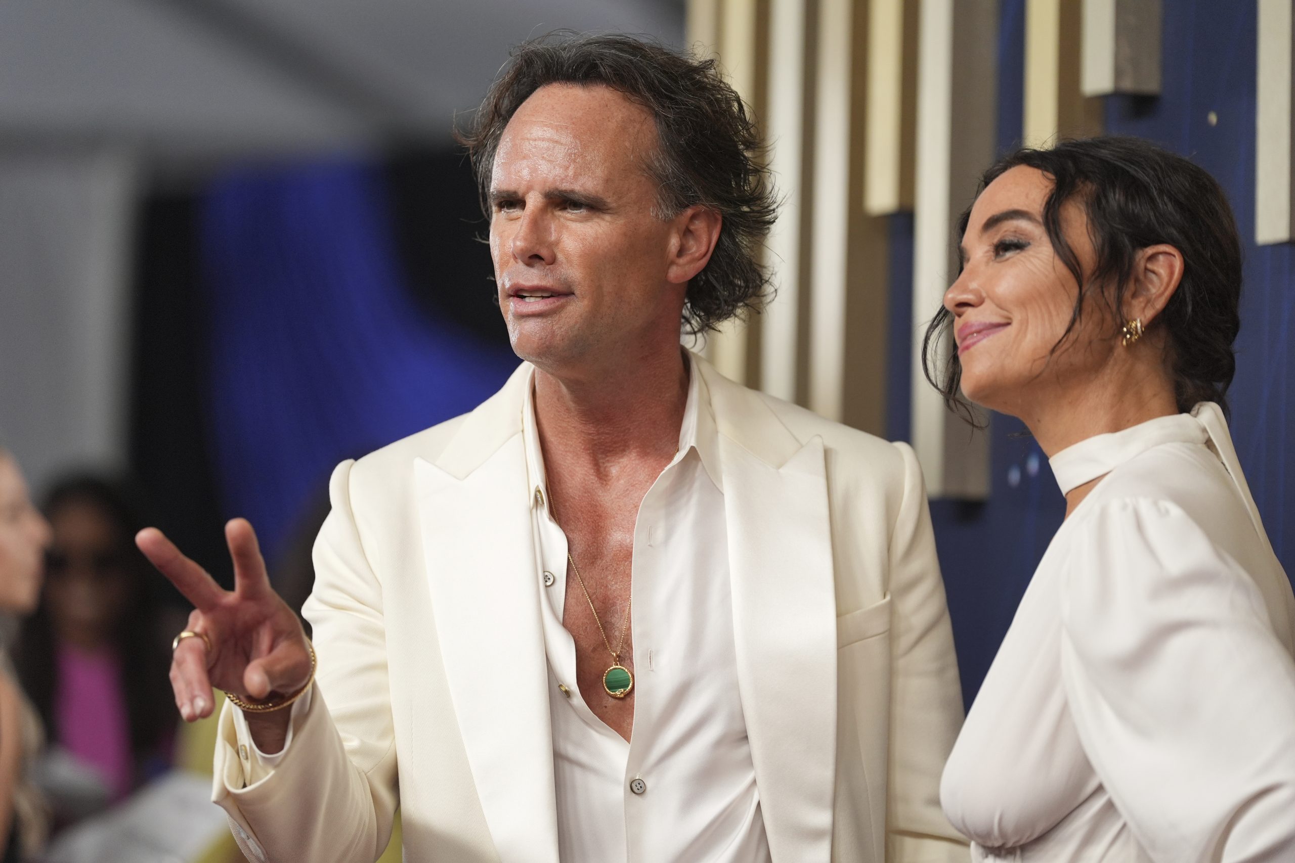 Walton Goggins, left, and Nadia Conners arrive at the 77th...
