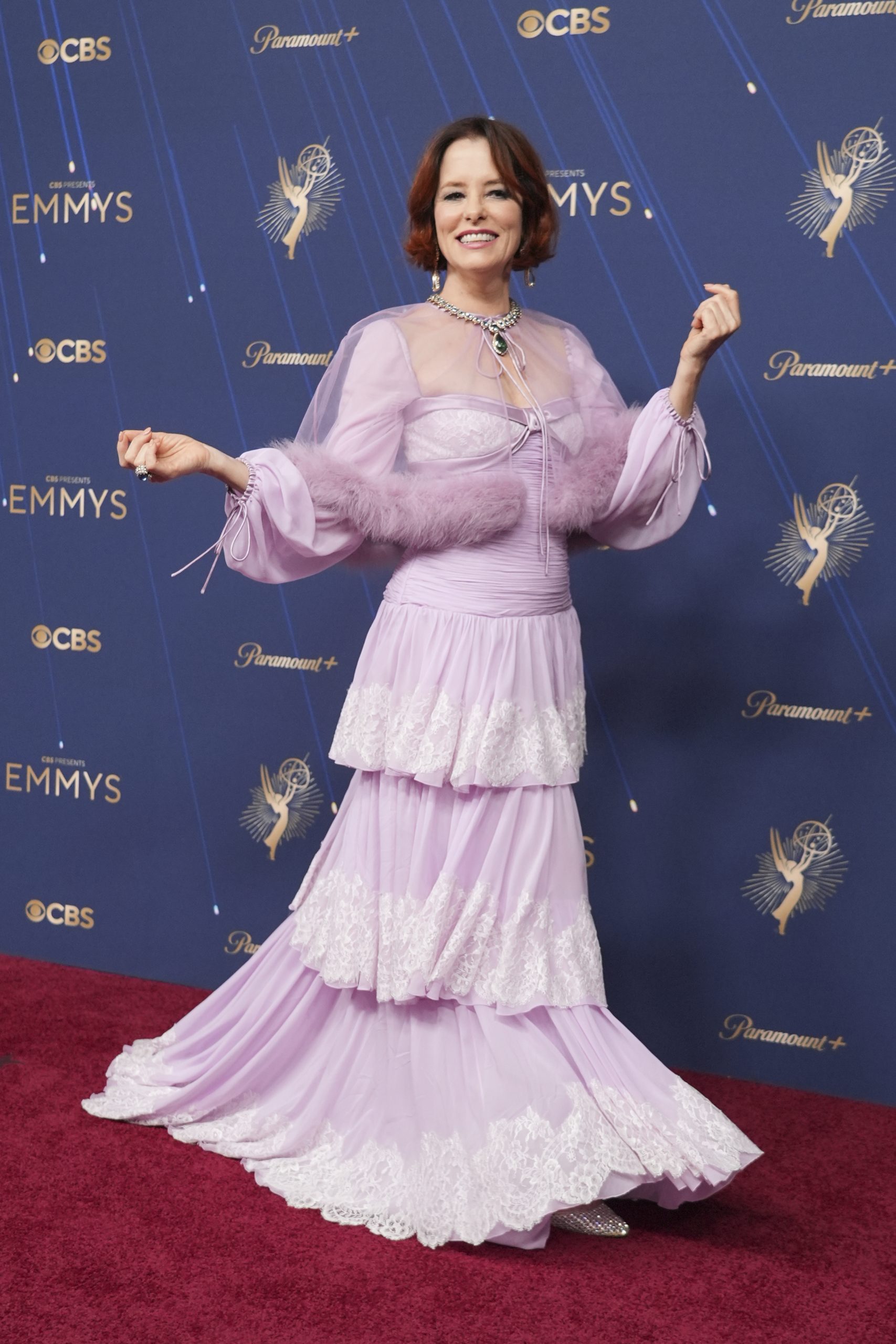 Parker Posey arrives at the 77th Primetime Emmy Awards on...