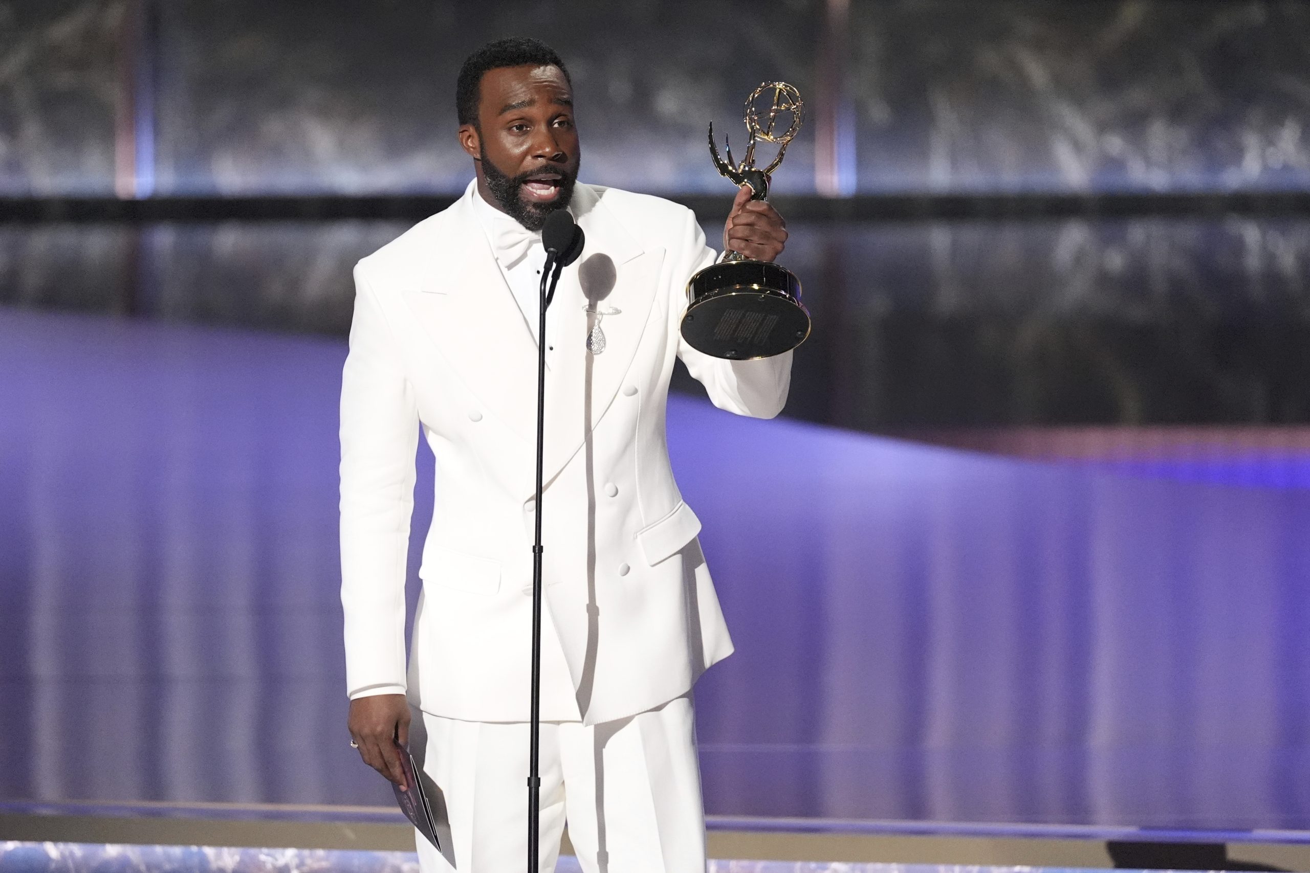 Tramell Tillman accepts the award for outstanding supporting actor in...